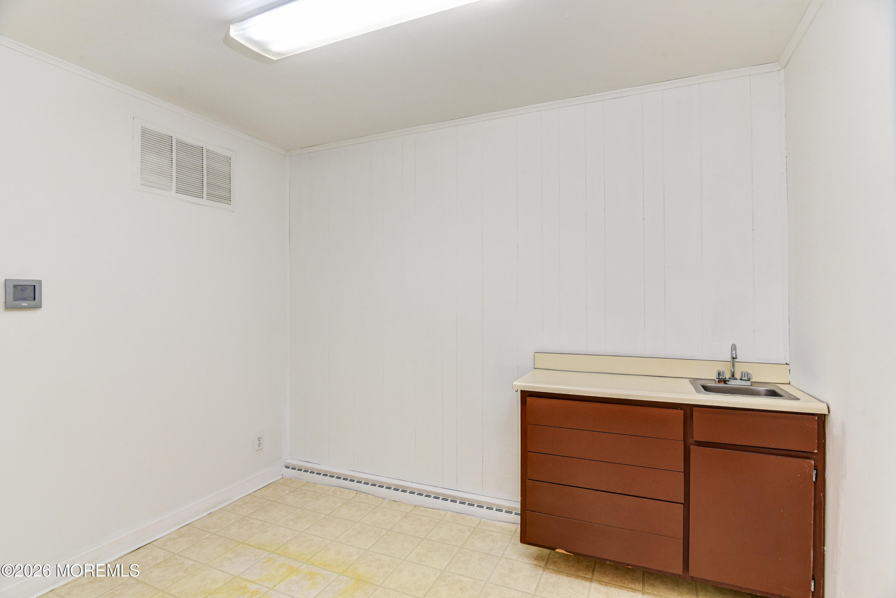 Main Street Milltown, NJ 08850 - Photo 25 of 37 a bathroom with a sink and vanity