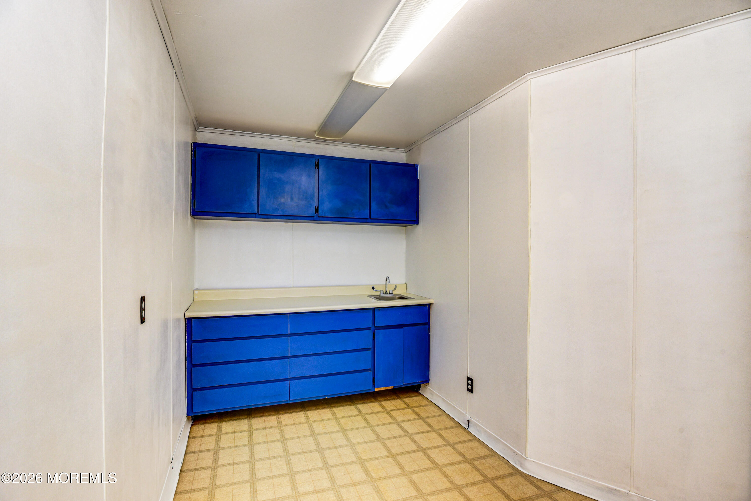 Main Street Milltown, NJ 08850 - Photo 28 of 37 a kitchen with a cabinets and wooden floor