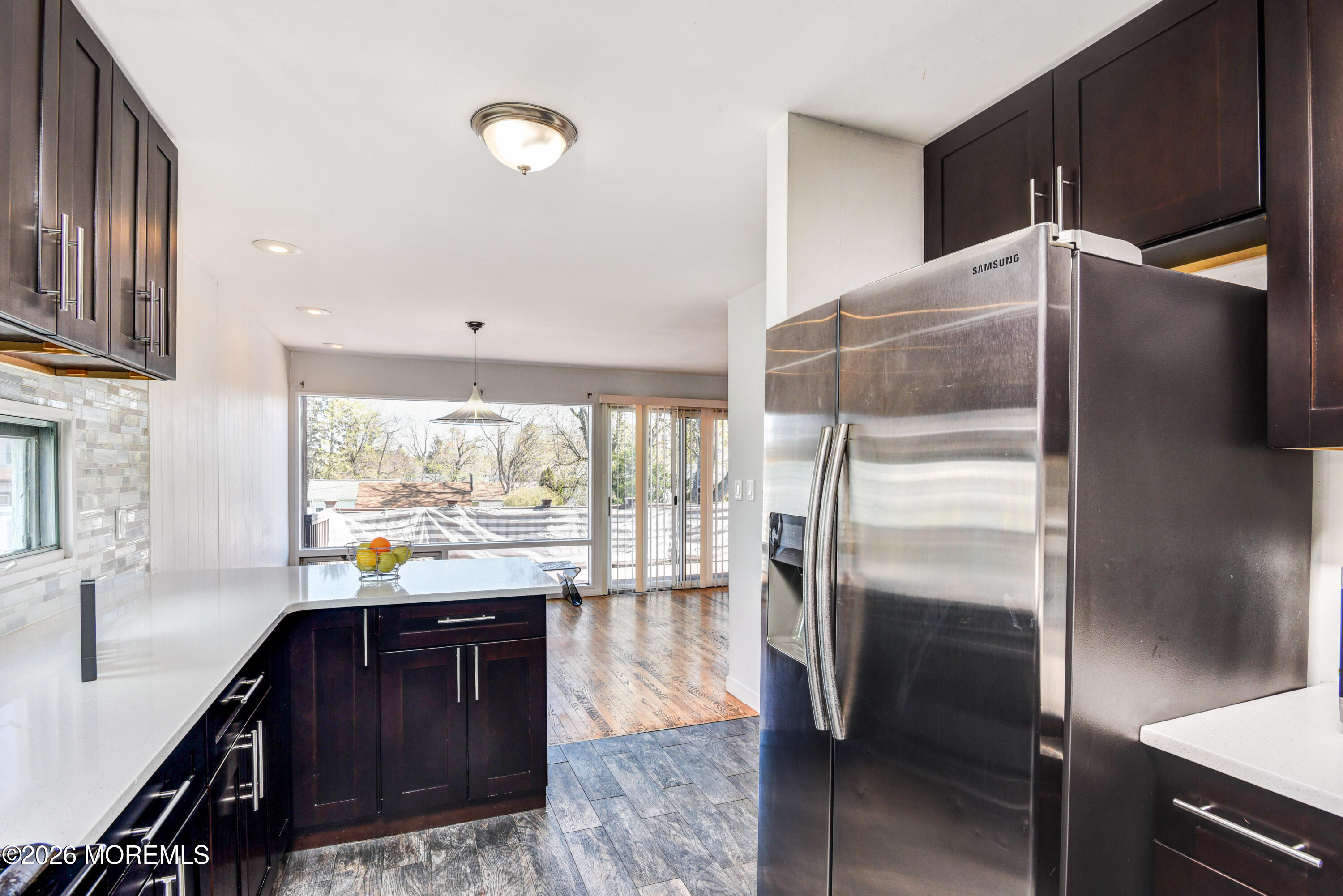 Main Street Milltown, NJ 08850 - Photo 9 of 37 a kitchen with stainless steel appliances granite countertop a refrigerator and a sink