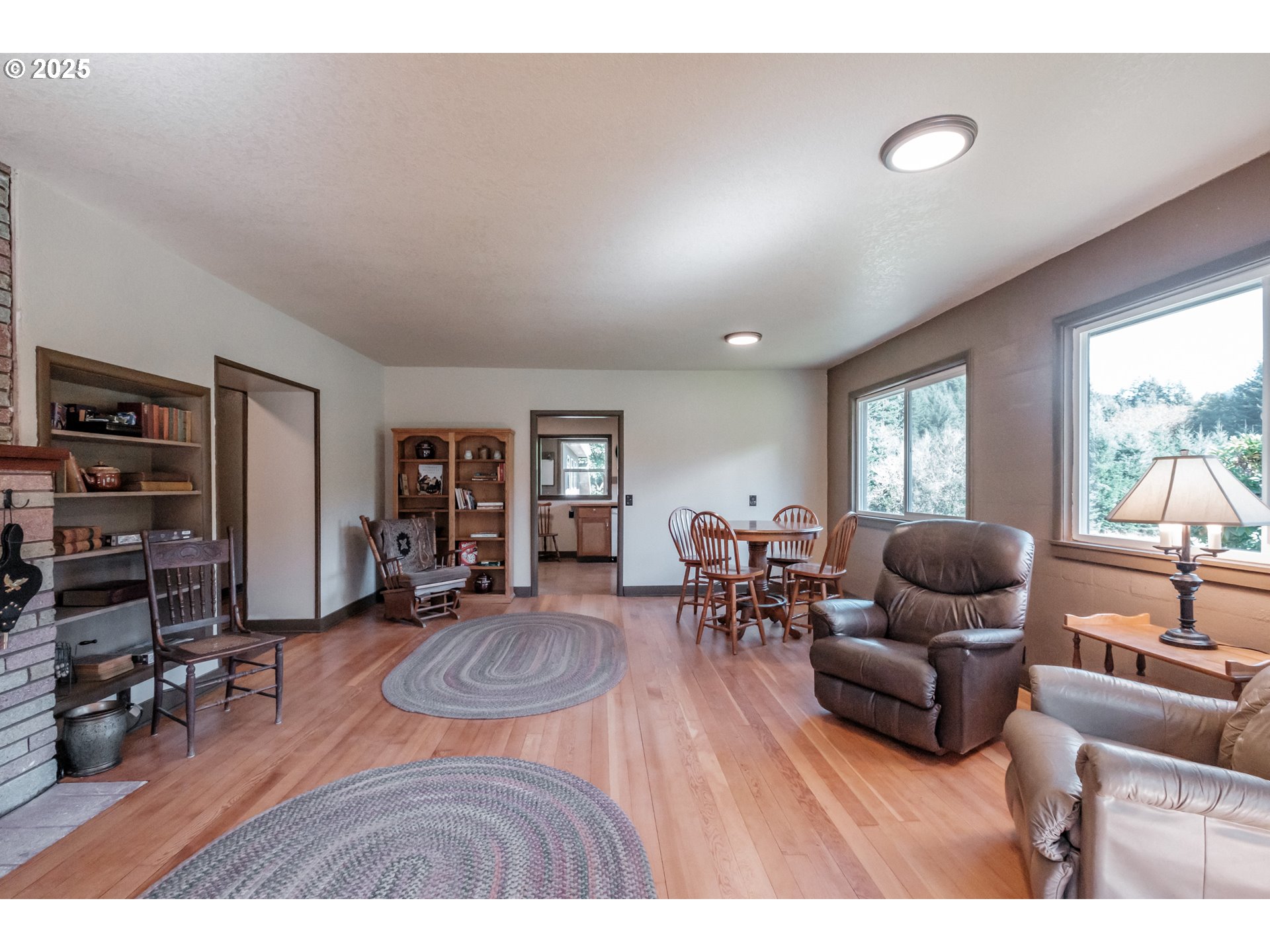 9602 Harlan Road Eddyville, OR 97343 - Photo 11 of 48 a living room with furniture and a window