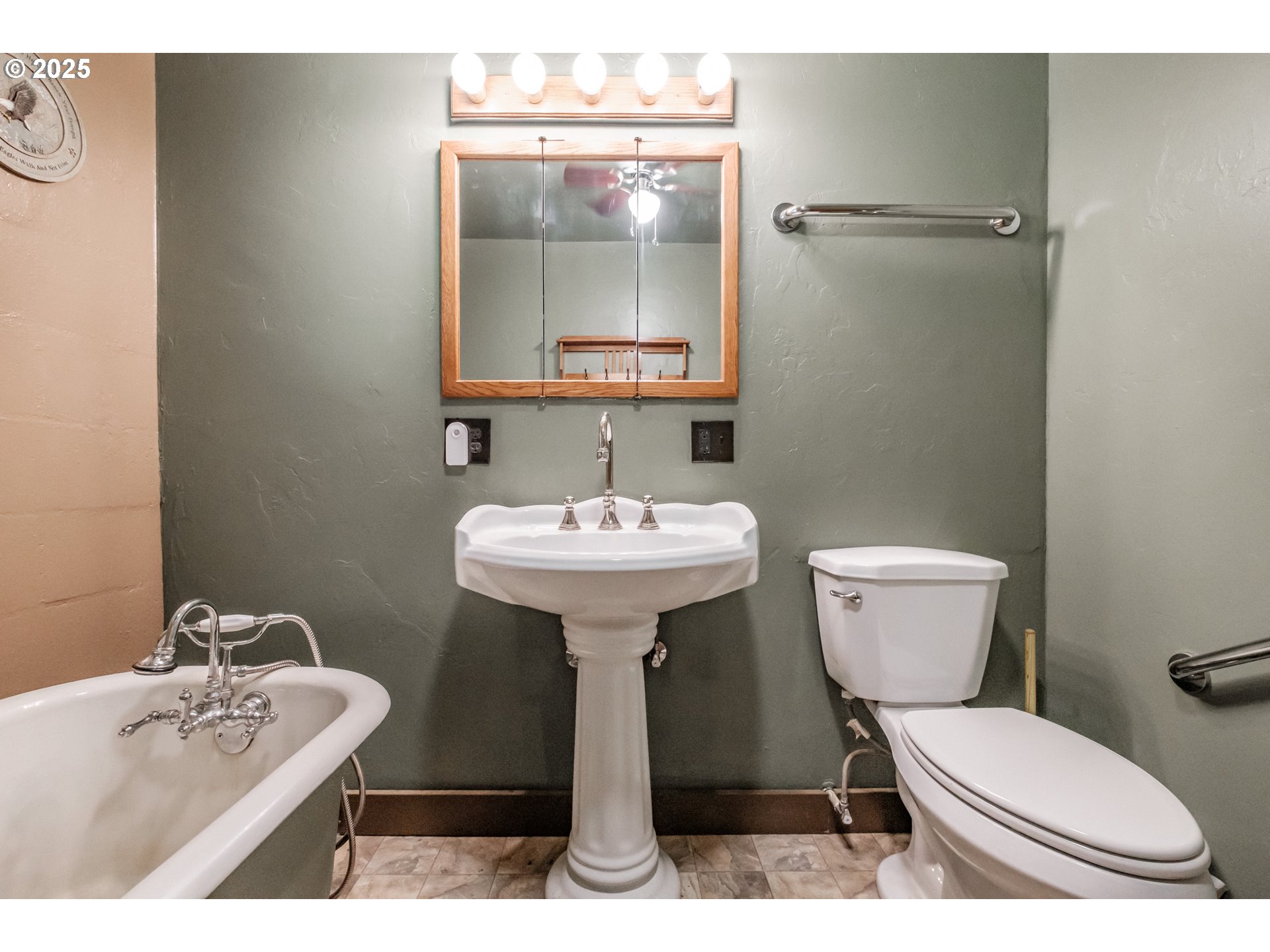 9602 Harlan Road Eddyville, OR 97343 - Photo 18 of 48 a bathroom with a sink toilet and a mirror