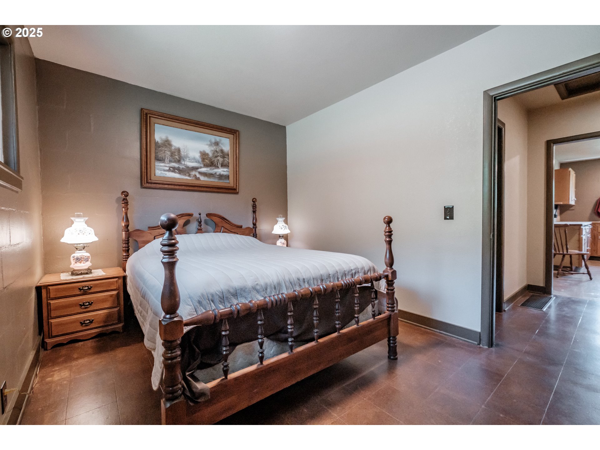 9602 Harlan Road Eddyville, OR 97343 - Photo 21 of 48 a bedroom with a bed and a view of bathroom