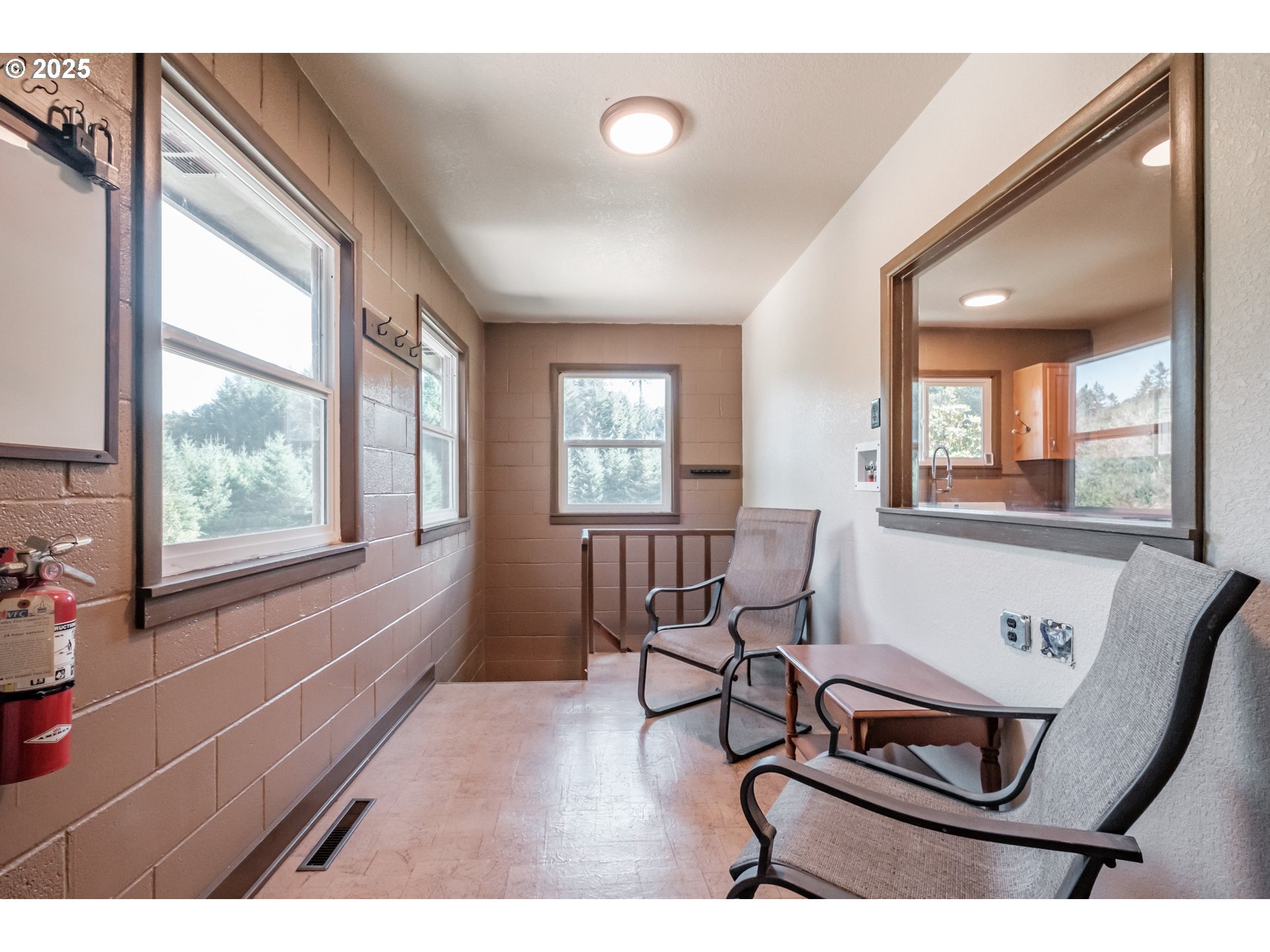 9602 Harlan Road Eddyville, OR 97343 - Photo 23 of 48 a living room with furniture and window