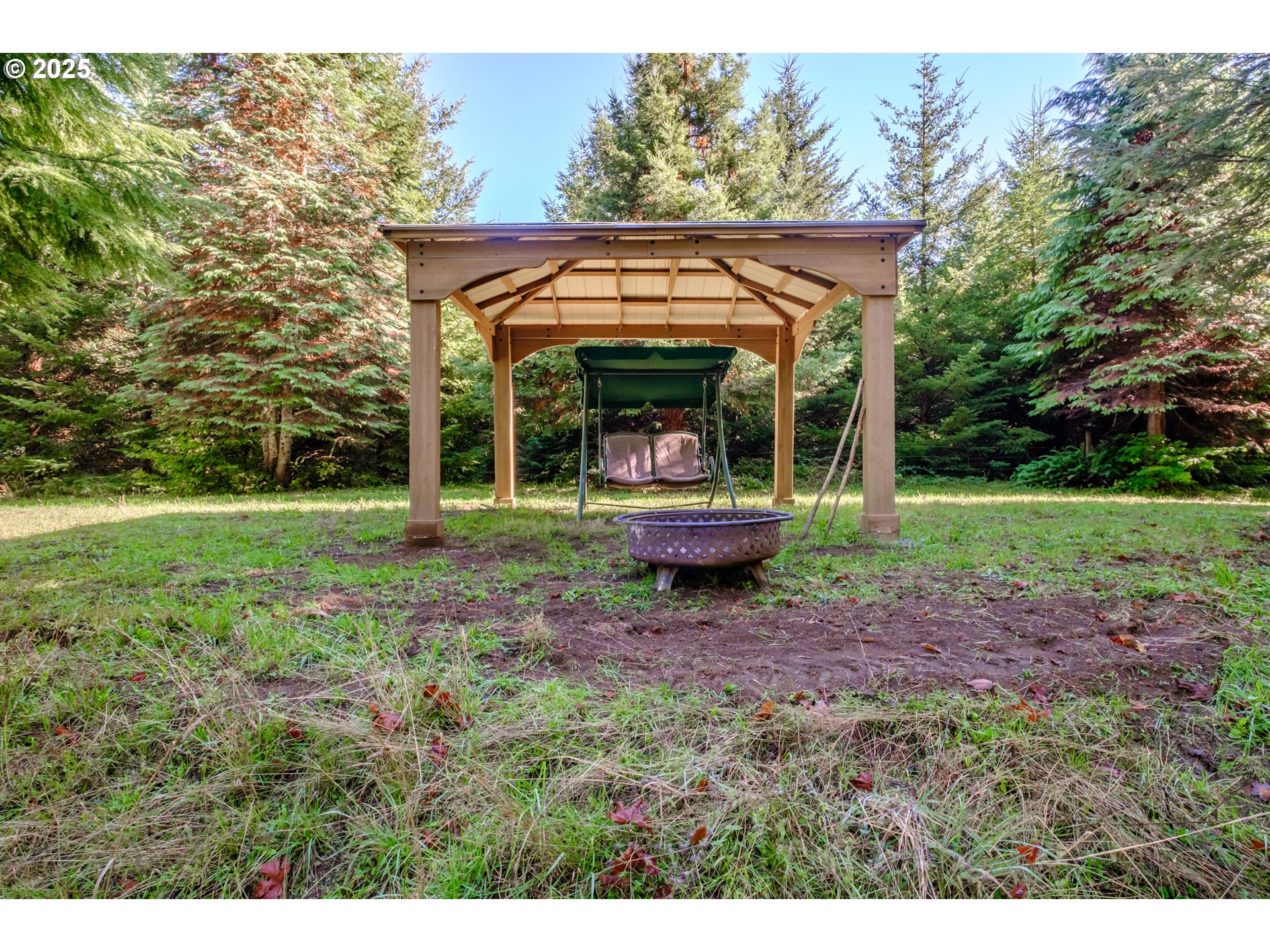 9602 Harlan Road Eddyville, OR 97343 - Photo 39 of 48 a view of a house with backyard and sitting area
