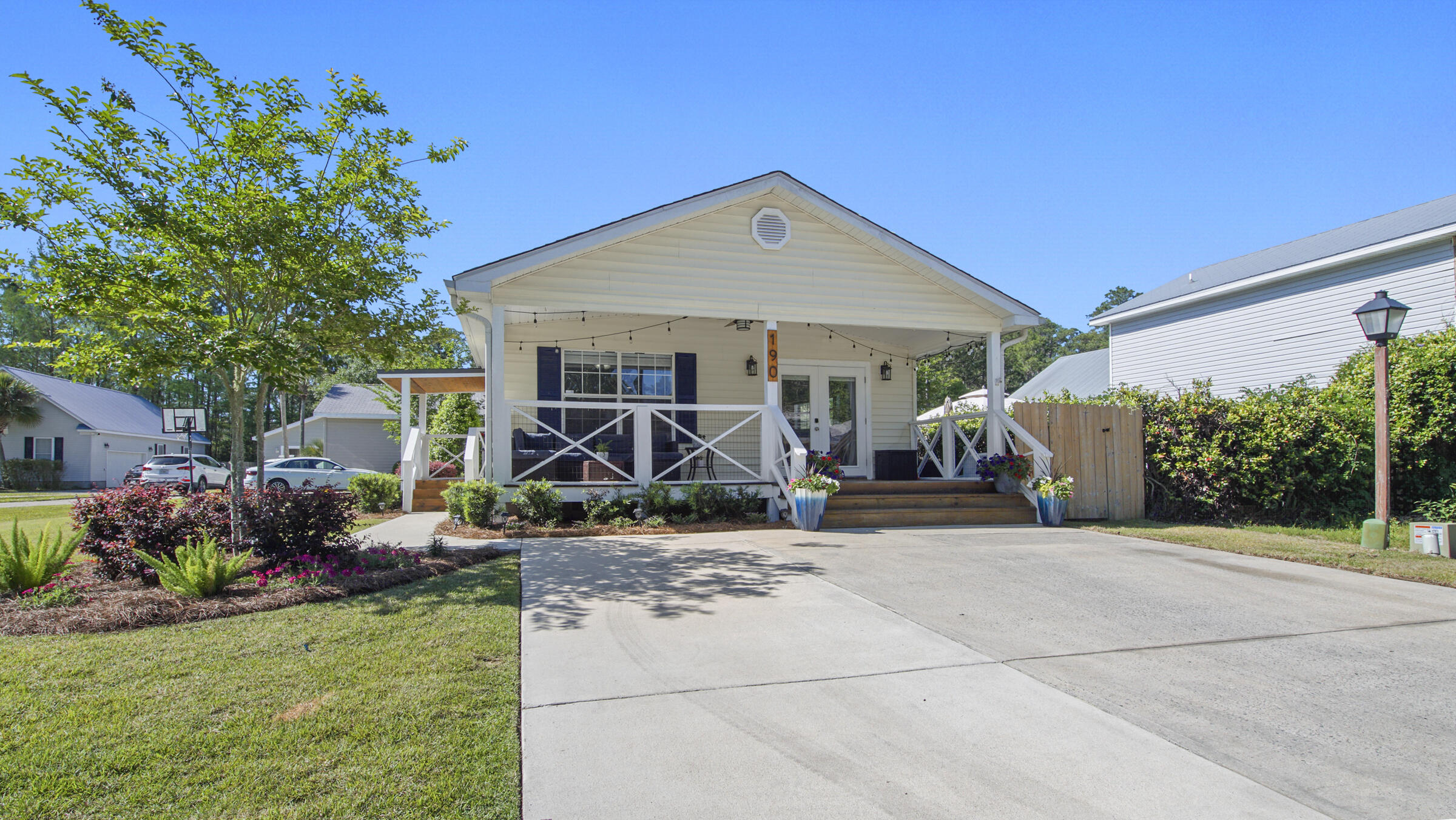 190 Plantation Way Santa Rosa Beach, FL 32459 - Photo 12 of 41 a view of a house with a patio
