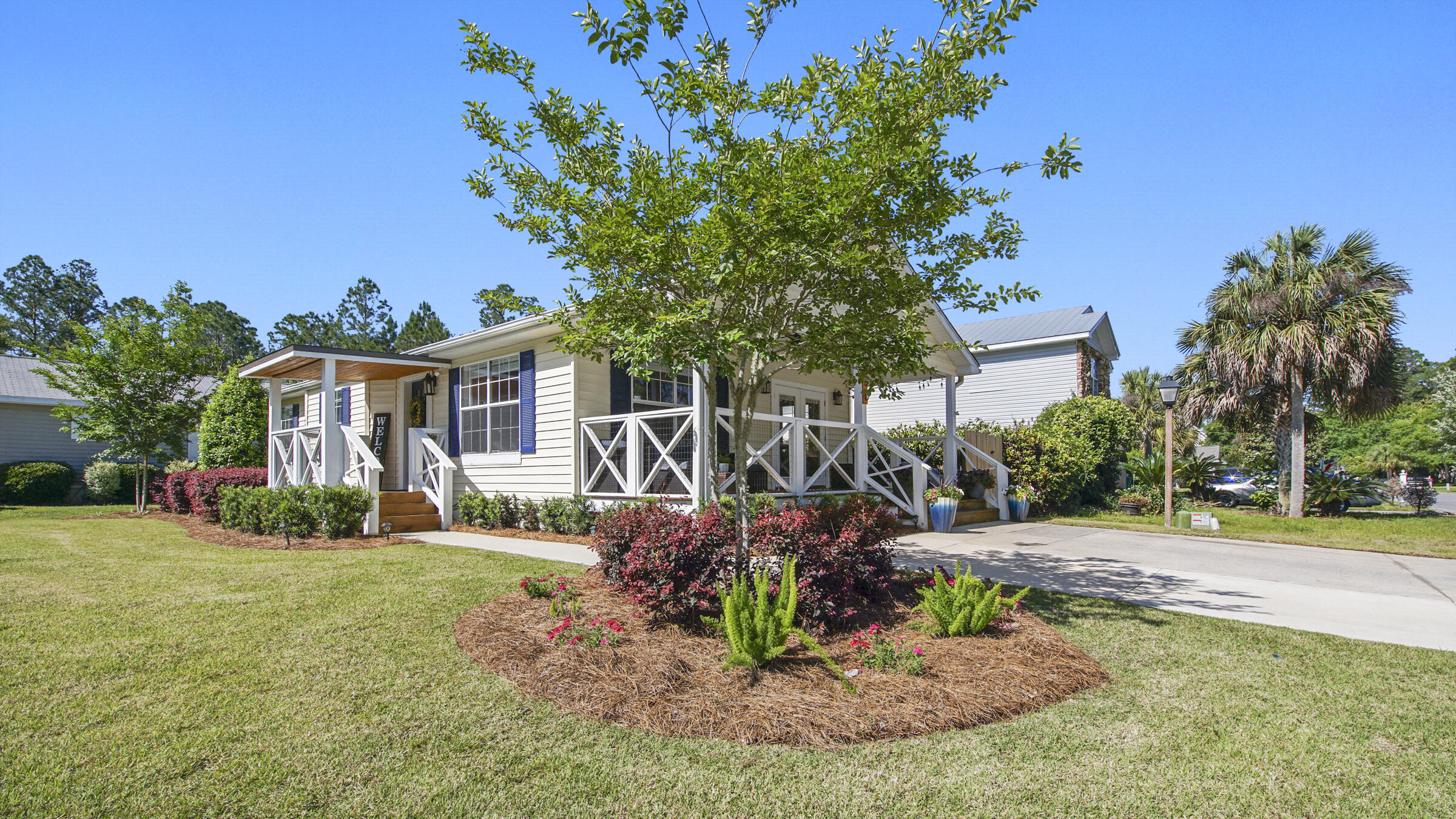 190 Plantation Way Santa Rosa Beach, FL 32459 - Photo 13 of 41 front view of a house with a yard