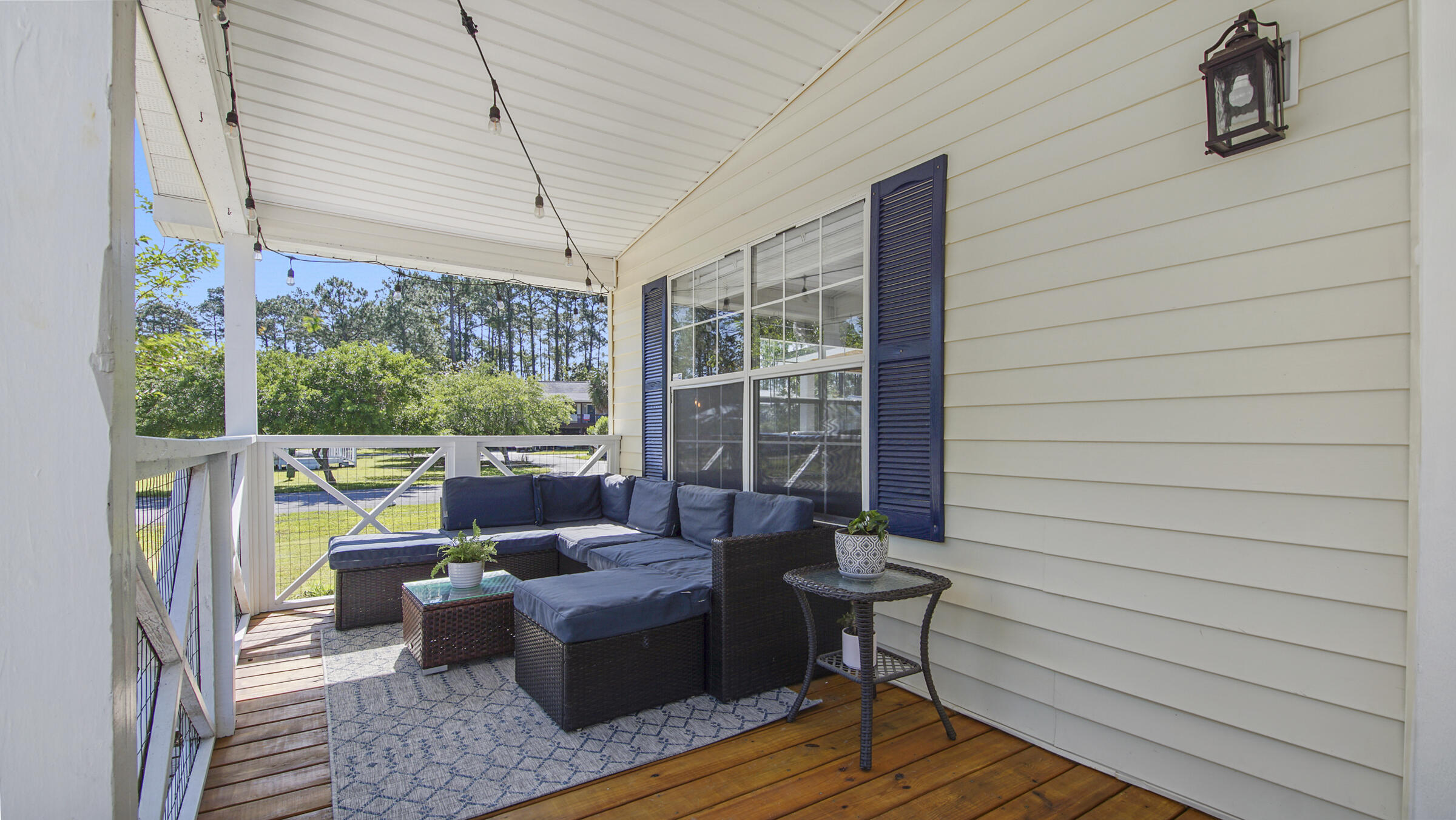 190 Plantation Way Santa Rosa Beach, FL 32459 - Photo 15 of 41 a building outdoor space with patio furniture