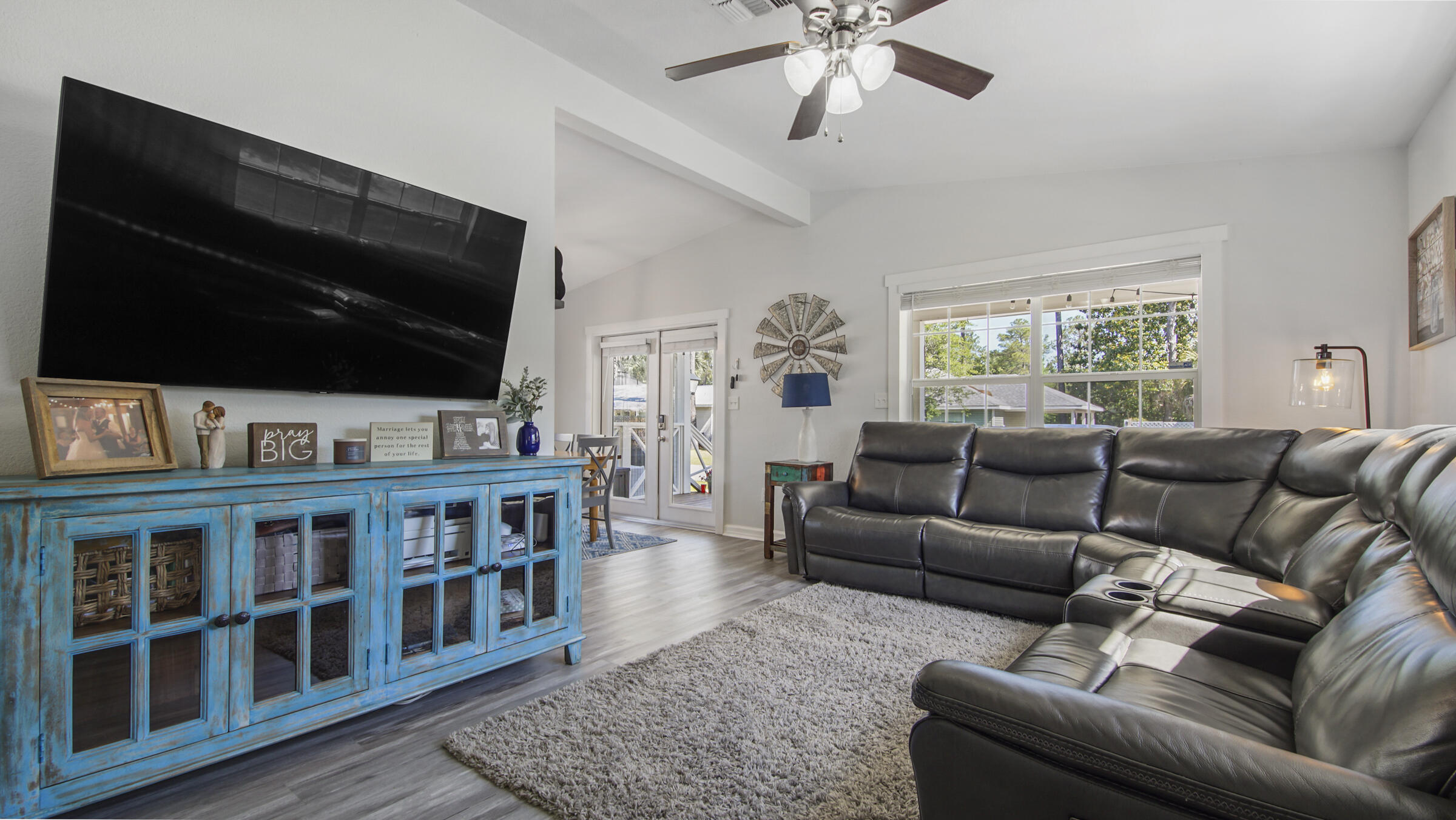 190 Plantation Way Santa Rosa Beach, FL 32459 - Photo 16 of 41 a living room with furniture and a flat screen tv