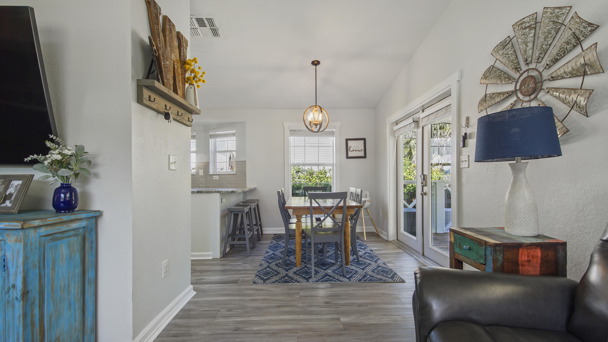 190 Plantation Way Santa Rosa Beach, FL 32459 - Photo 17 of 41 a view of a dining room with furniture and wooden floor