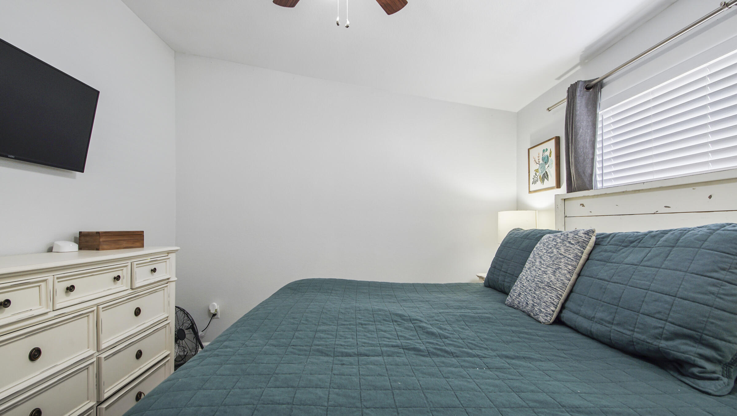 190 Plantation Way Santa Rosa Beach, FL 32459 - Photo 32 of 41 a bedroom with a bed and flat screen tv