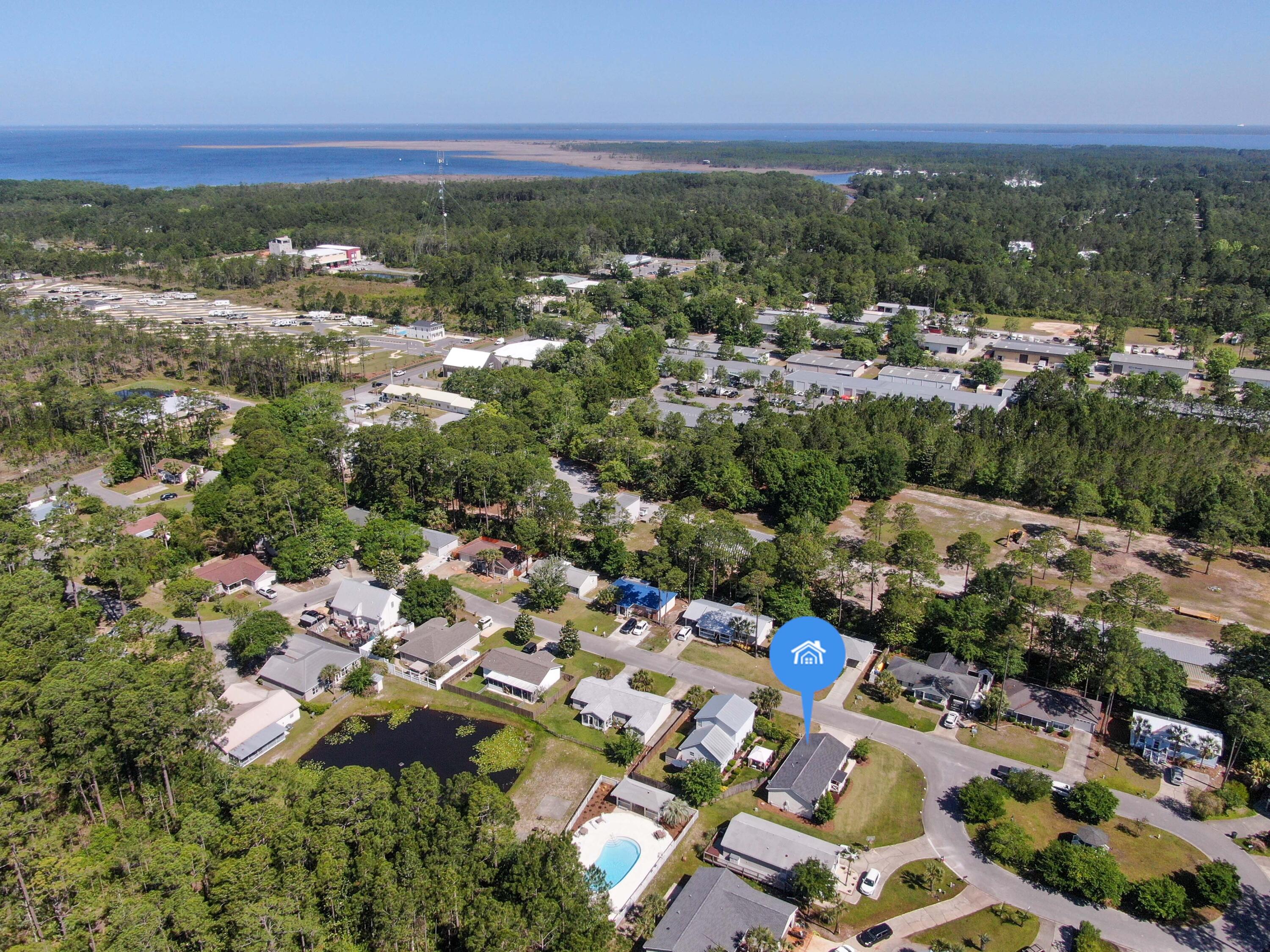 190 Plantation Way Santa Rosa Beach, FL 32459 - Photo 5 of 41 an aerial view of a city with lots of residential buildings