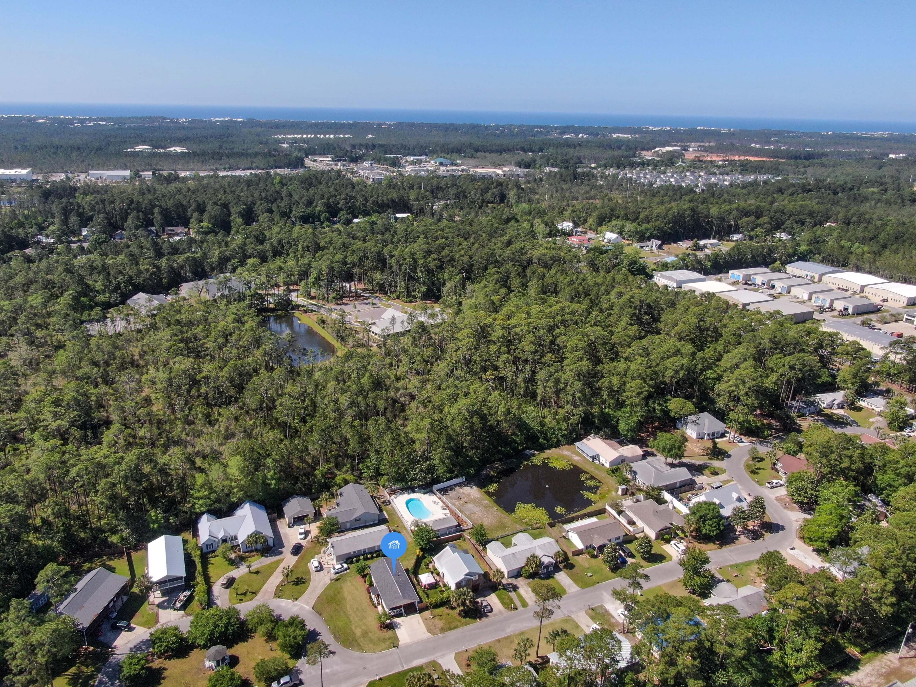 190 Plantation Way Santa Rosa Beach, FL 32459 - Photo 7 of 41 an aerial view of a houses with a yard
