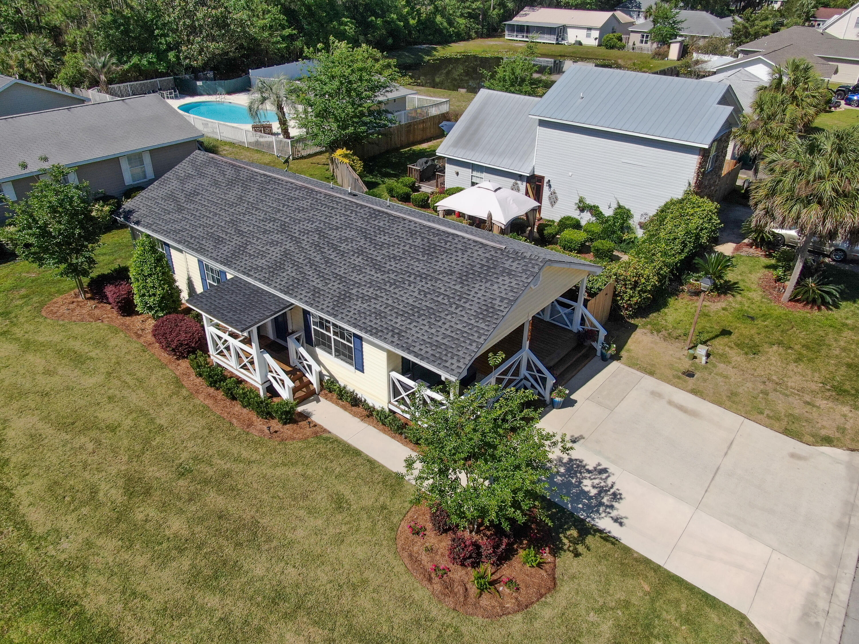 190 Plantation Way Santa Rosa Beach, FL 32459 - Photo 10 of 41 an aerial view of a house with a yard and potted plants