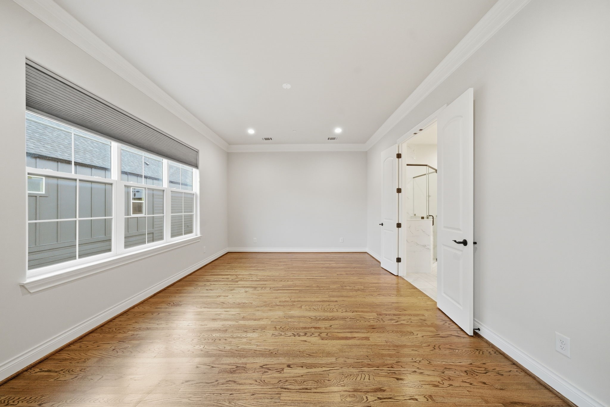 4224 Gibson Street Houston, TX 77007 - Photo 12 of 22 a view of an empty room with a window