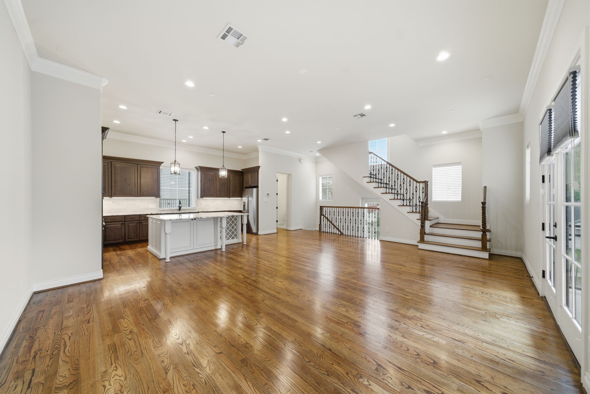 4224 Gibson Street Houston, TX 77007 - Photo 5 of 22 a view of a kitchen with cabinets and wooden floor