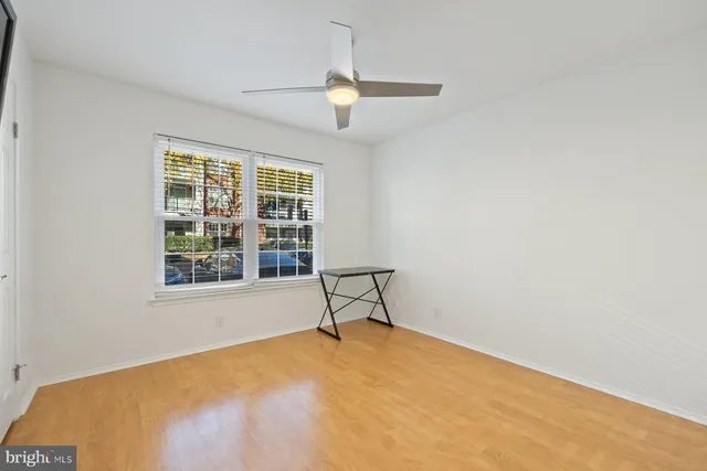 a view of a bedroom with a window