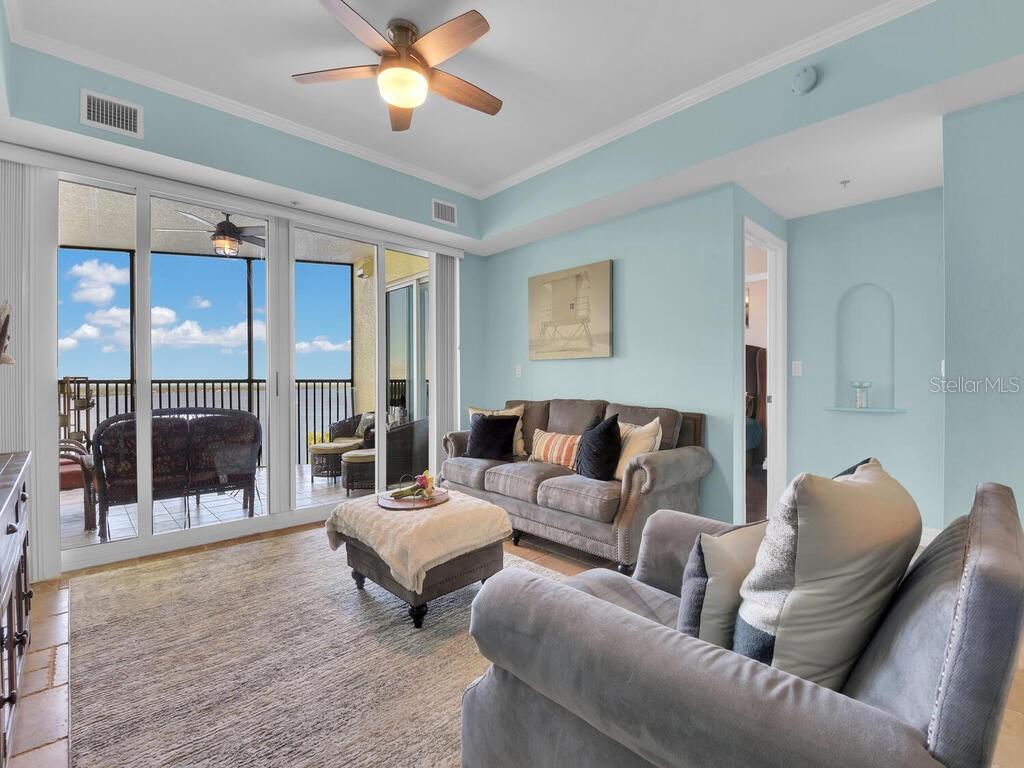 2797 First Street, Unit 1605 Fort Myers, FL 33916 - Photo 14 of 38 a living room with furniture and a large window