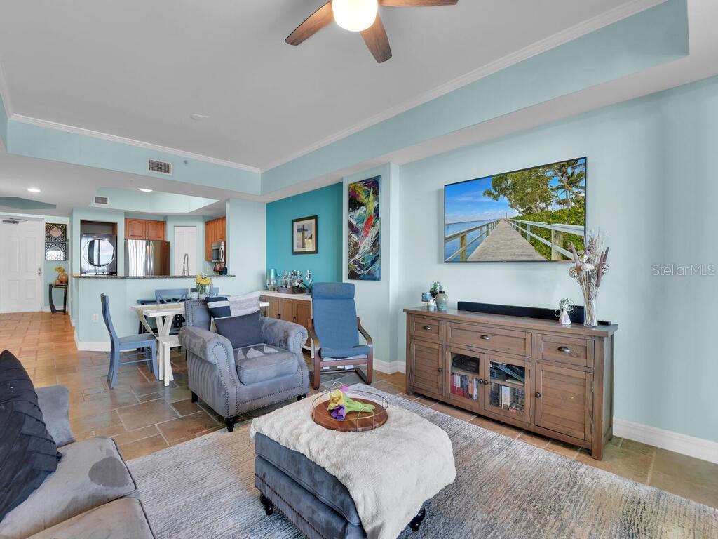 2797 First Street, Unit 1605 Fort Myers, FL 33916 - Photo 15 of 38 a living room with furniture and a fireplace