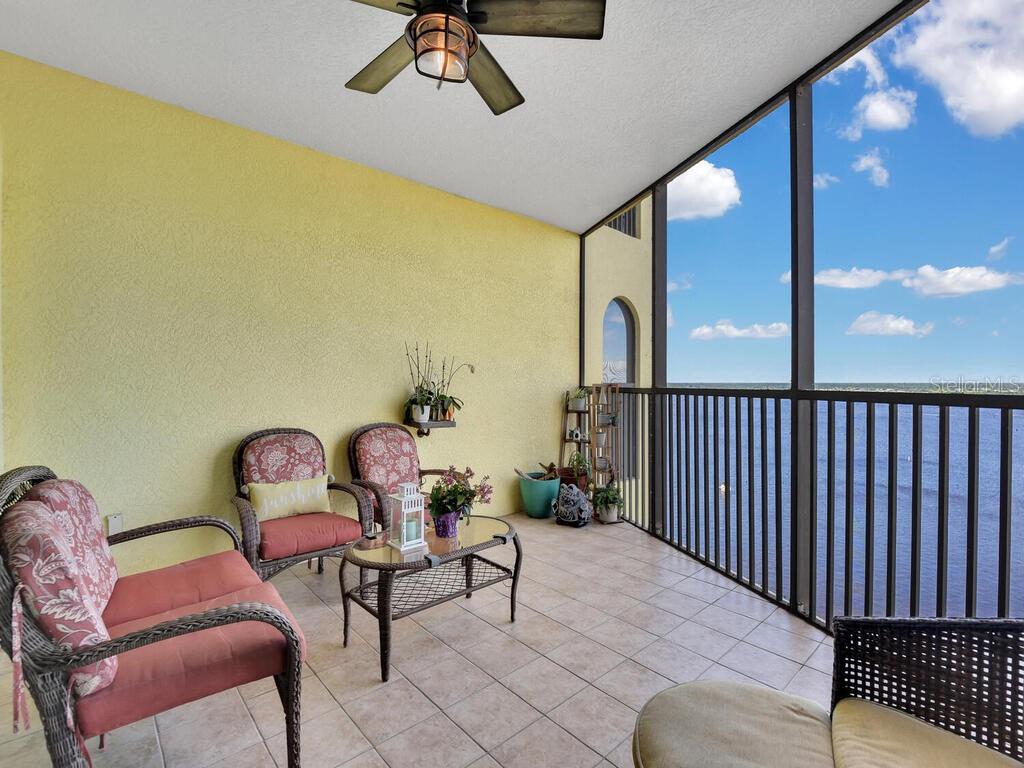 2797 First Street, Unit 1605 Fort Myers, FL 33916 - Photo 26 of 38 a balcony with furniture and a potted plant