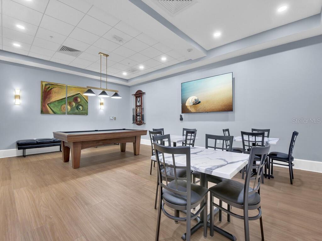 2797 First Street, Unit 1605 Fort Myers, FL 33916 - Photo 33 of 38 a view of a dining room with furniture