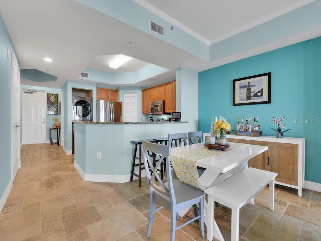 2797 First Street, Unit 1605 Fort Myers, FL 33916 - Photo 8 of 38 a view of a dining room with furniture
