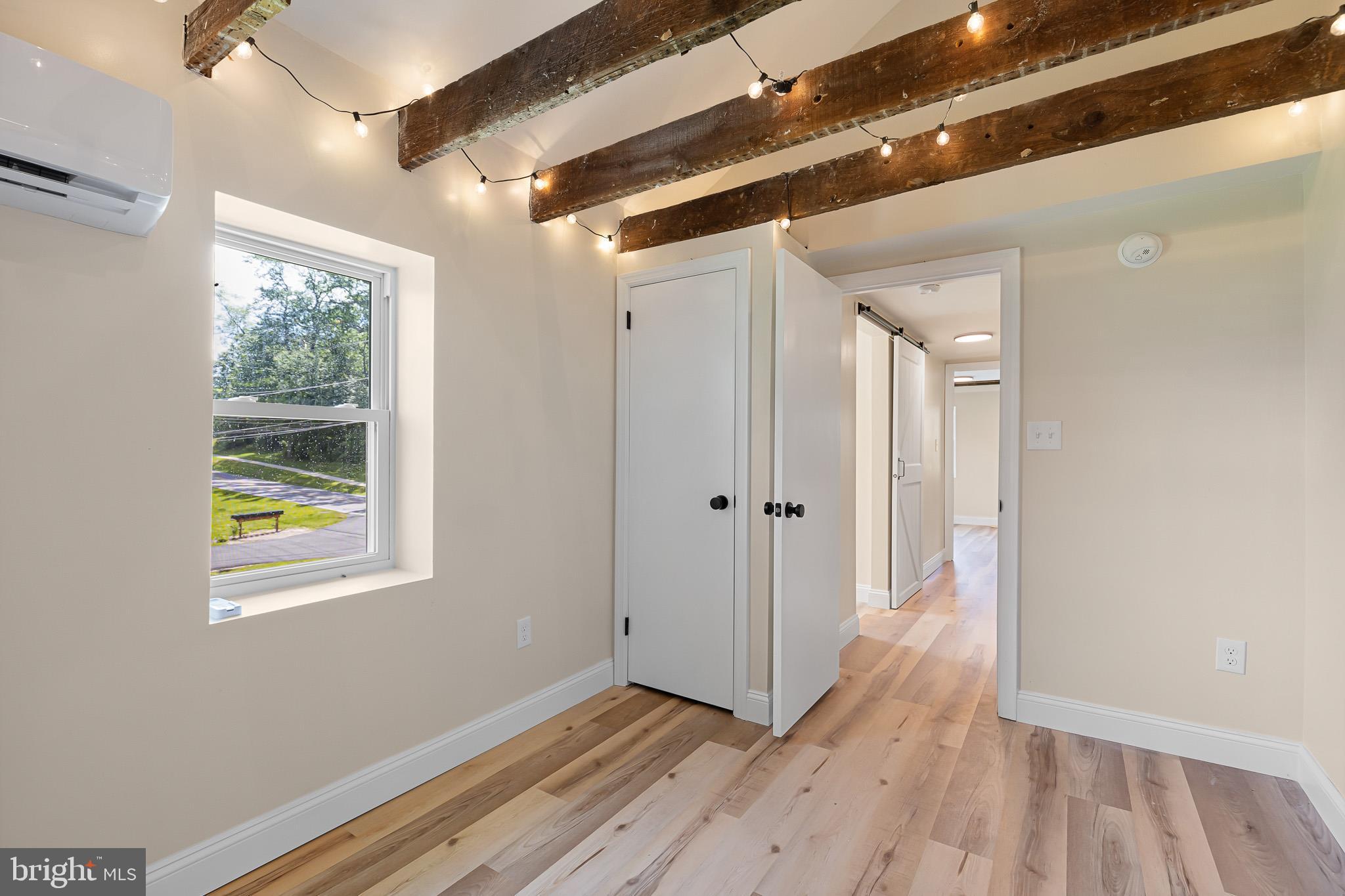 563 Rosedale Road Kennett Square, PA 19348 - Photo 9 of 18 1st bedroom with vaulted ceiling and exposed joist