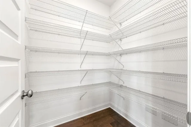 a view of an empty walk in closet