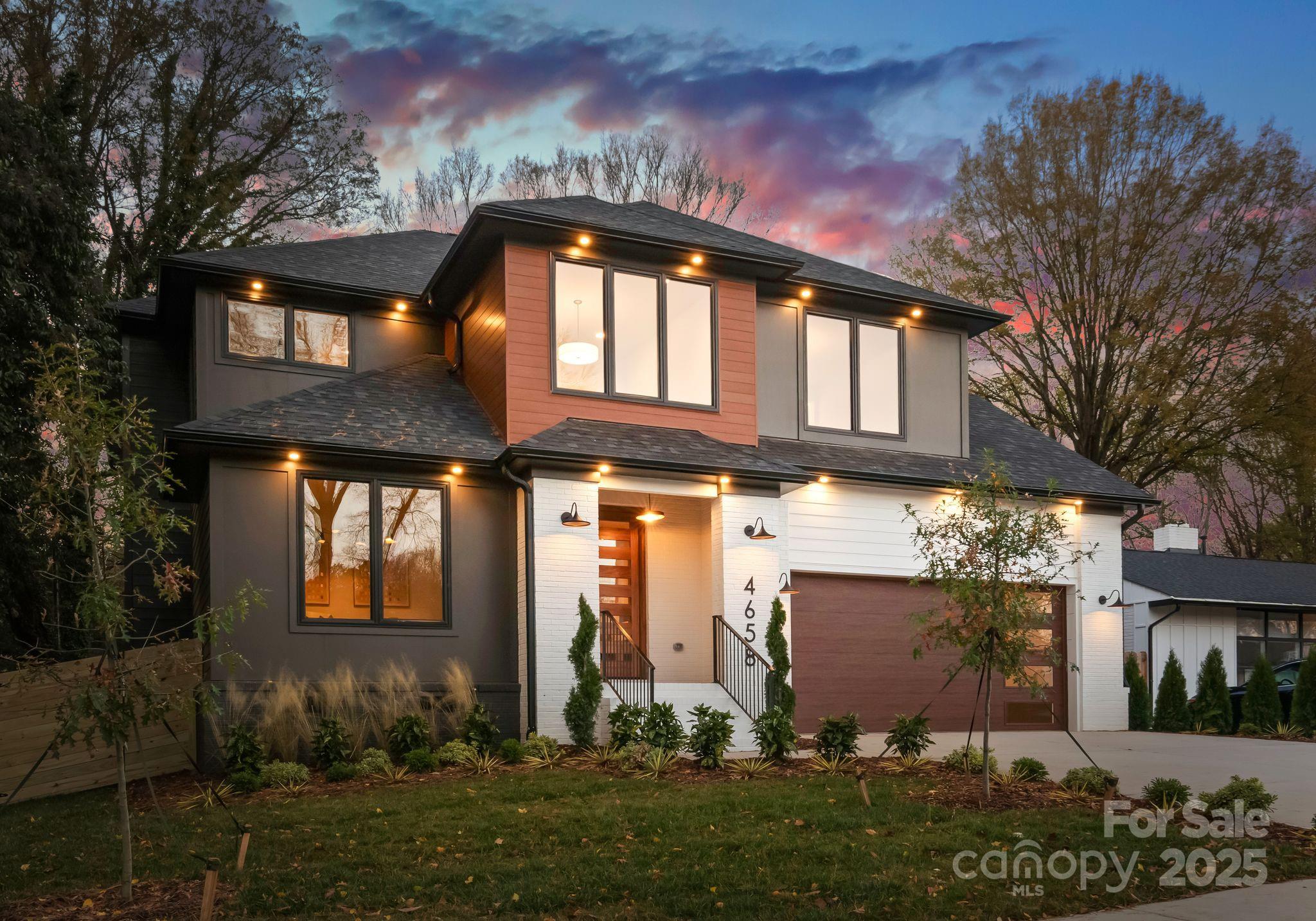 4658 Murrayhill Road Charlotte, NC 28209 - Photo 2 of 48 a front view of a house with a yard