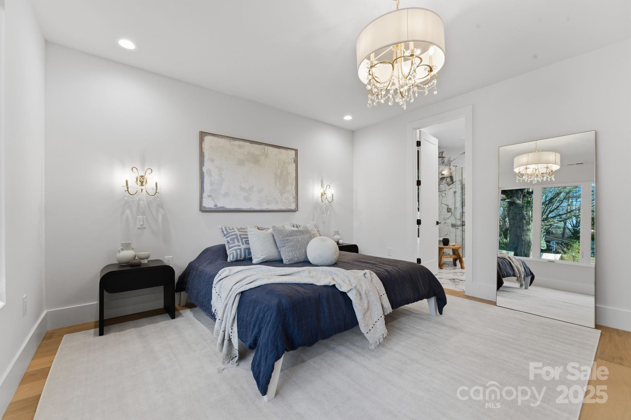 4658 Murrayhill Road Charlotte, NC 28209 - Photo 22 of 48 a bedroom with bed and a large window