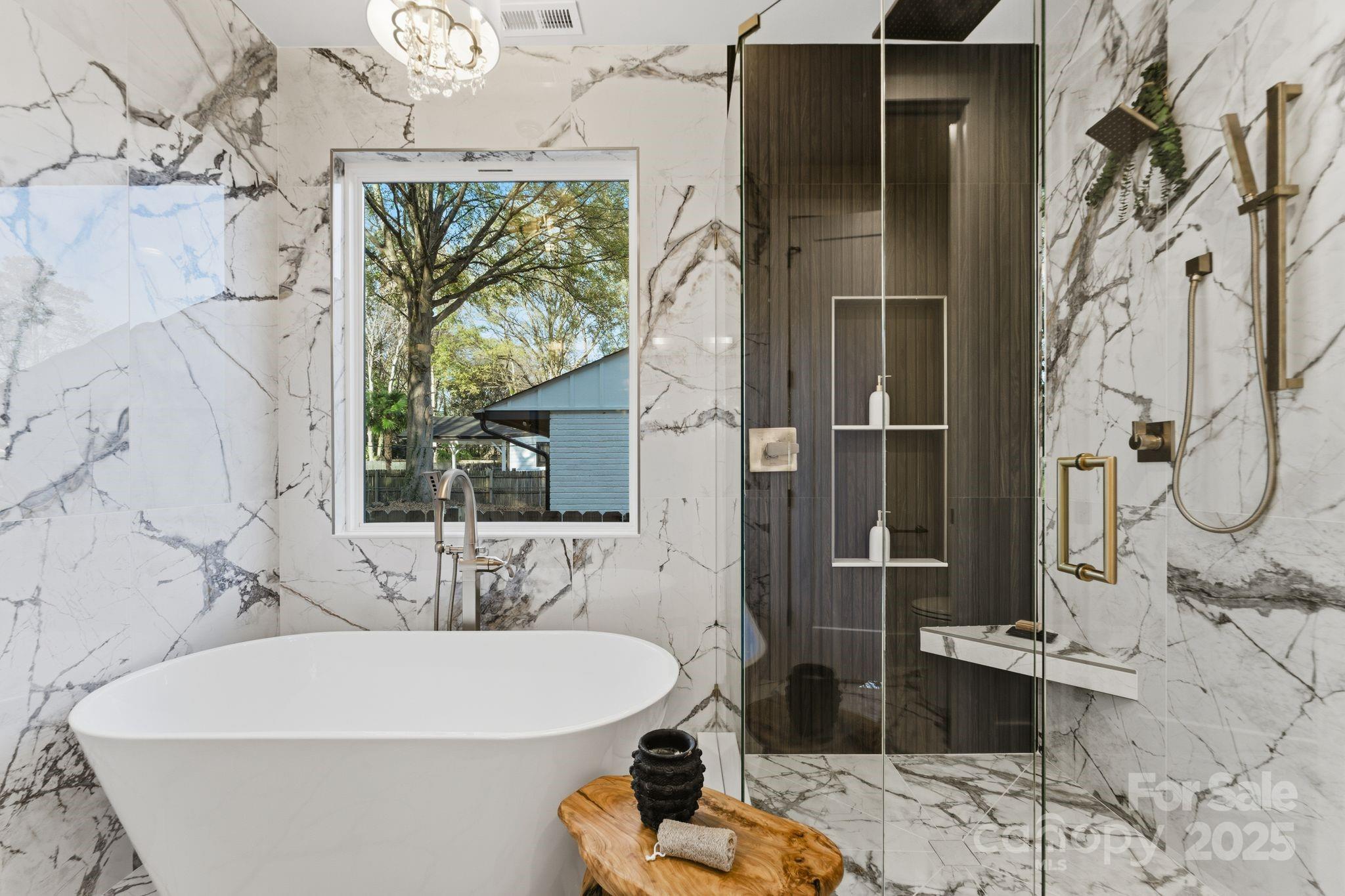 4658 Murrayhill Road Charlotte, NC 28209 - Photo 24 of 48 a bathroom with a bathtub and a shower