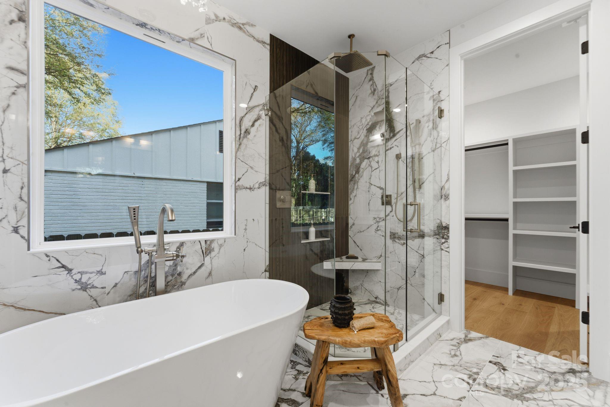 4658 Murrayhill Road Charlotte, NC 28209 - Photo 25 of 48 a bathroom with a bathtub and a shower