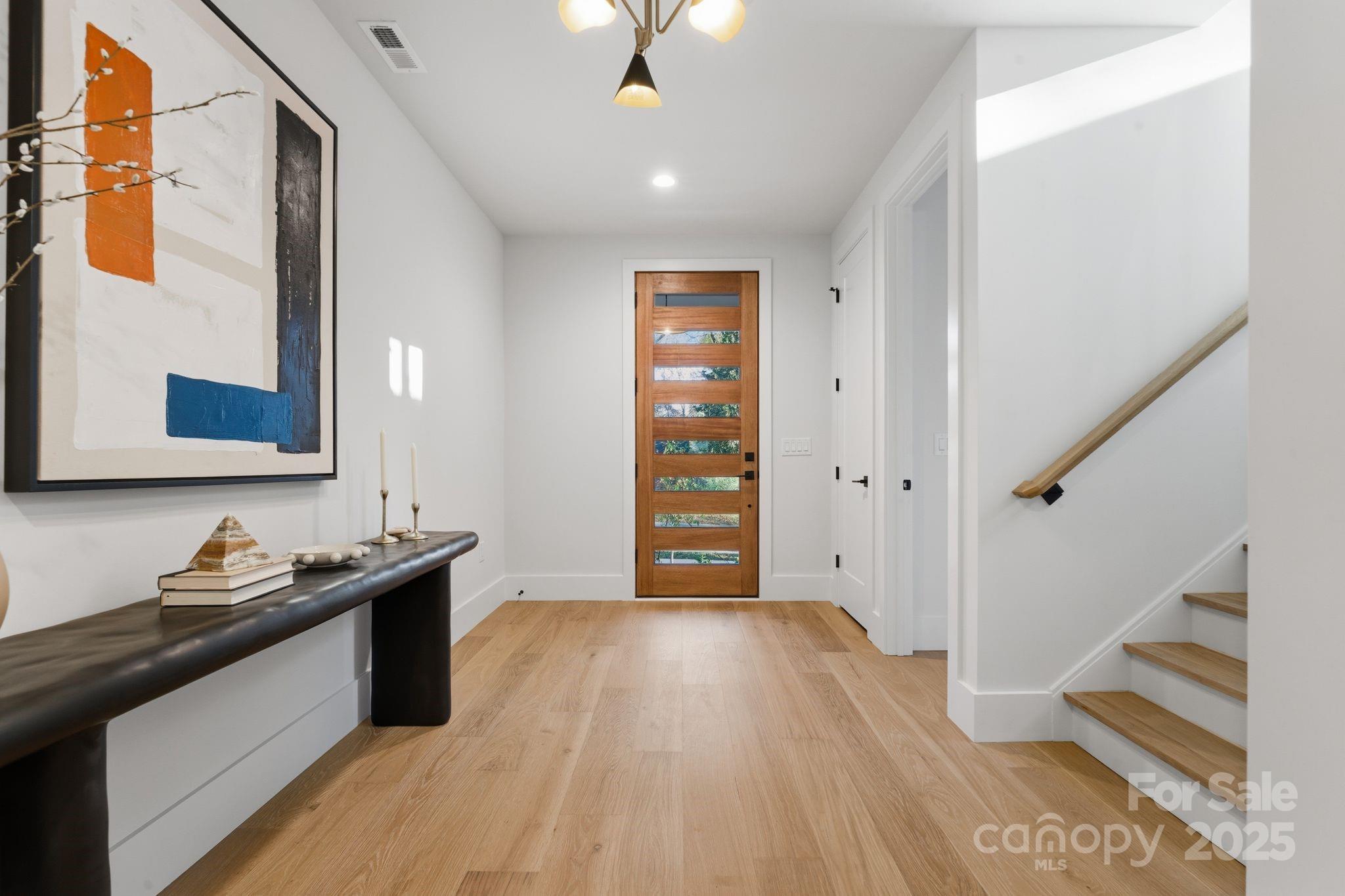 4658 Murrayhill Road Charlotte, NC 28209 - Photo 4 of 48 a kitchen with a sink and wooden floor