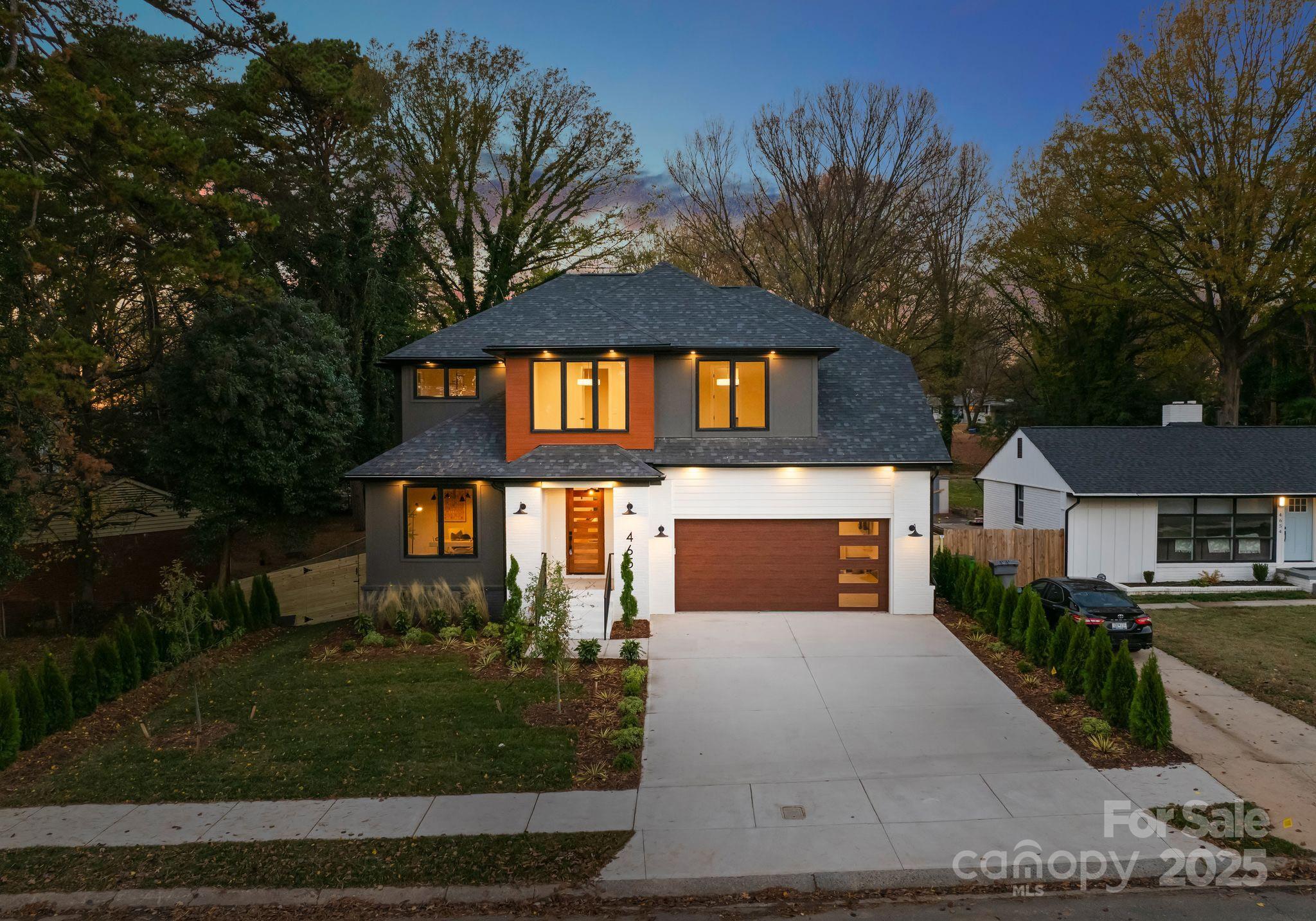 4658 Murrayhill Road Charlotte, NC 28209 - Photo 46 of 48 a front view of a house with garden