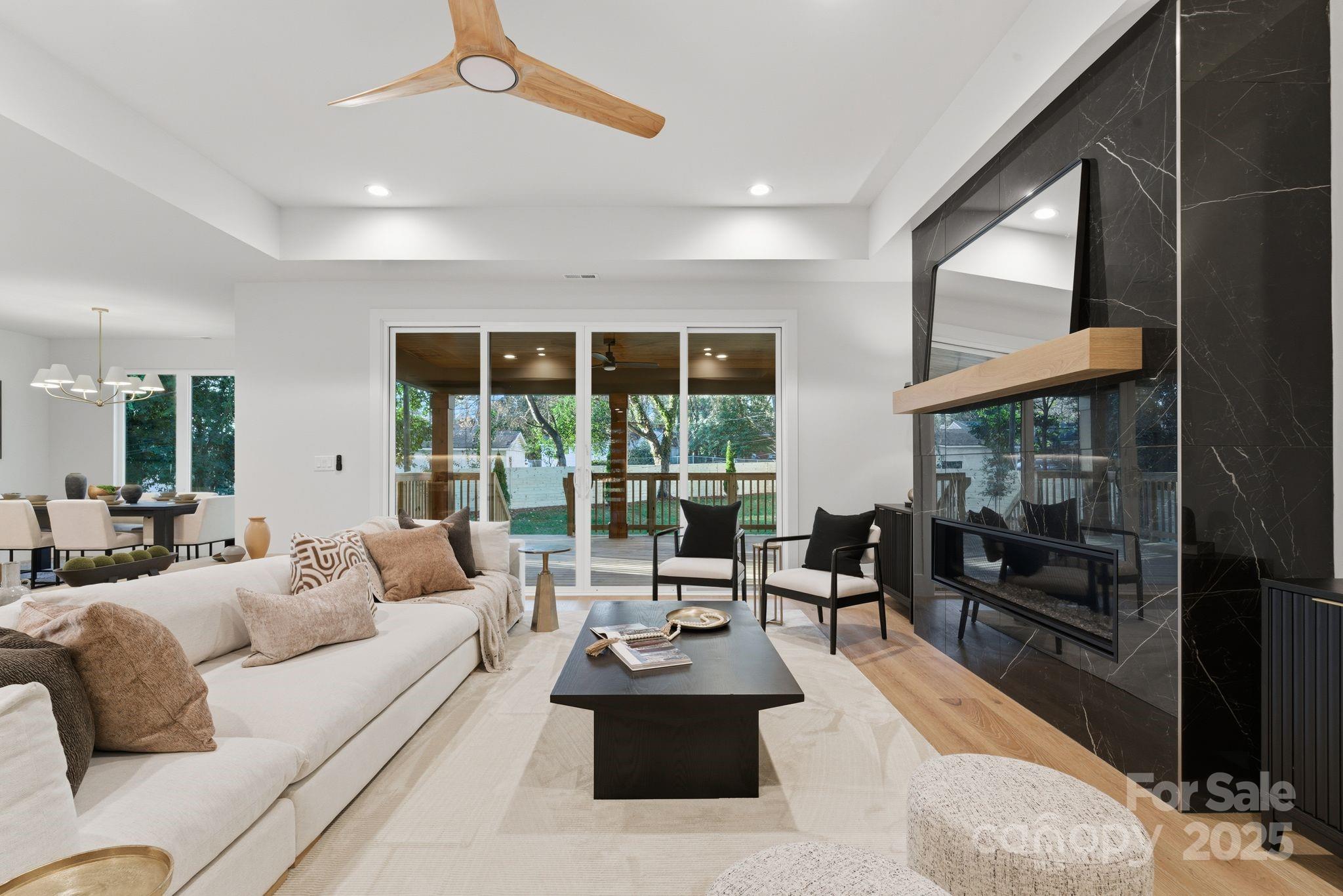 4658 Murrayhill Road Charlotte, NC 28209 - Photo 8 of 48 a living room with furniture and a large window