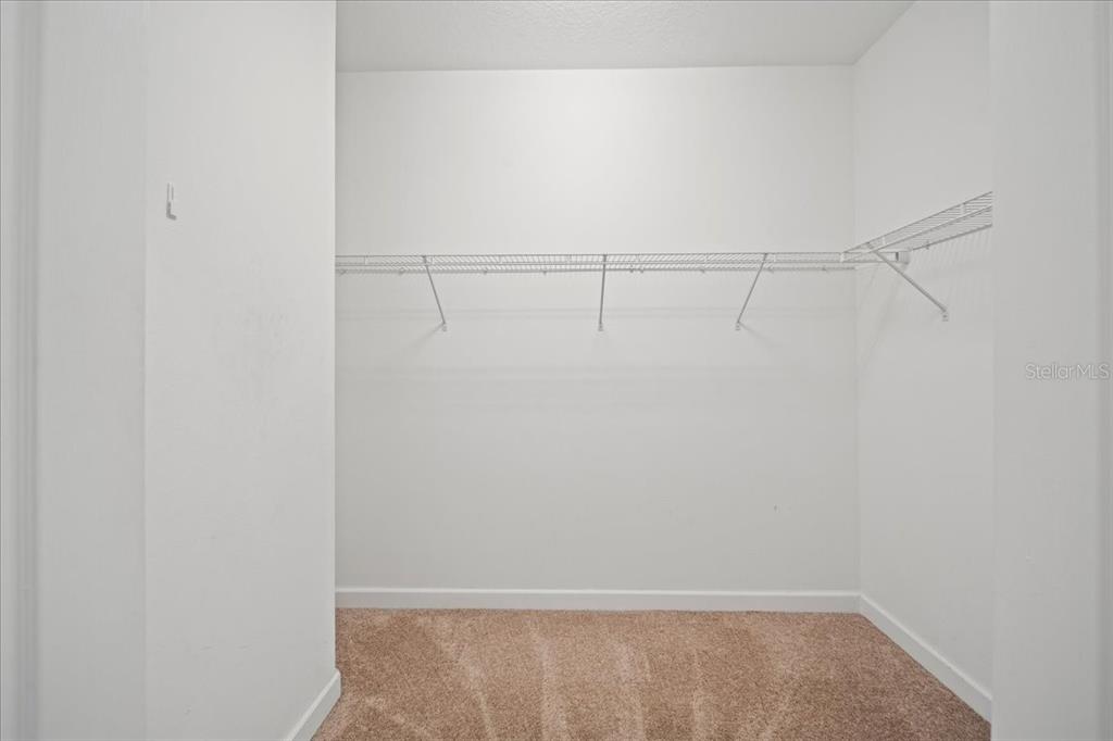 3565 Raleigh Drive Winter Haven, FL 33884 - Photo 22 of 73 a view of small space with racks on the wall
