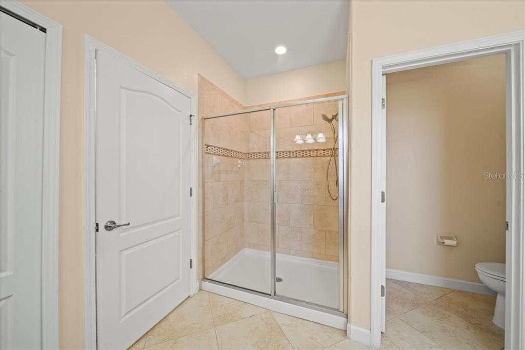 3565 Raleigh Drive Winter Haven, FL 33884 - Photo 23 of 73 a bathroom with a shower and a toilet