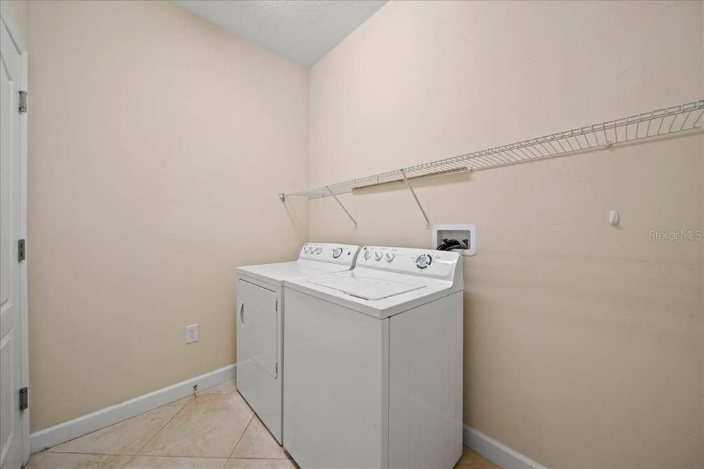 3565 Raleigh Drive Winter Haven, FL 33884 - Photo 29 of 73 a utility room with dryer and washer