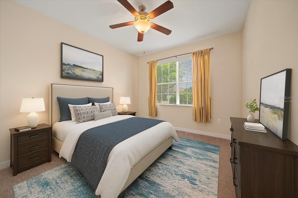 3565 Raleigh Drive Winter Haven, FL 33884 - Photo 30 of 73 a bedroom with a bed and a flat screen tv