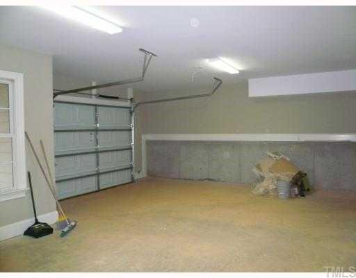 12500 Oneal Road Wake Forest, NC 27587 - Photo 10 of 12 3rd car garage with workshop area