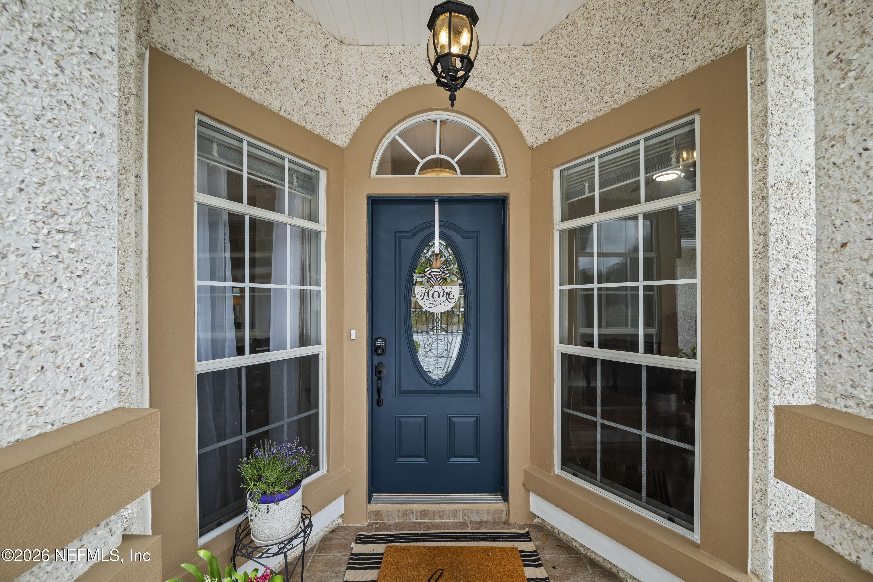 1940 Bluebonnet Way Fleming Island, FL 32003 - Photo 11 of 72 10 Front Door