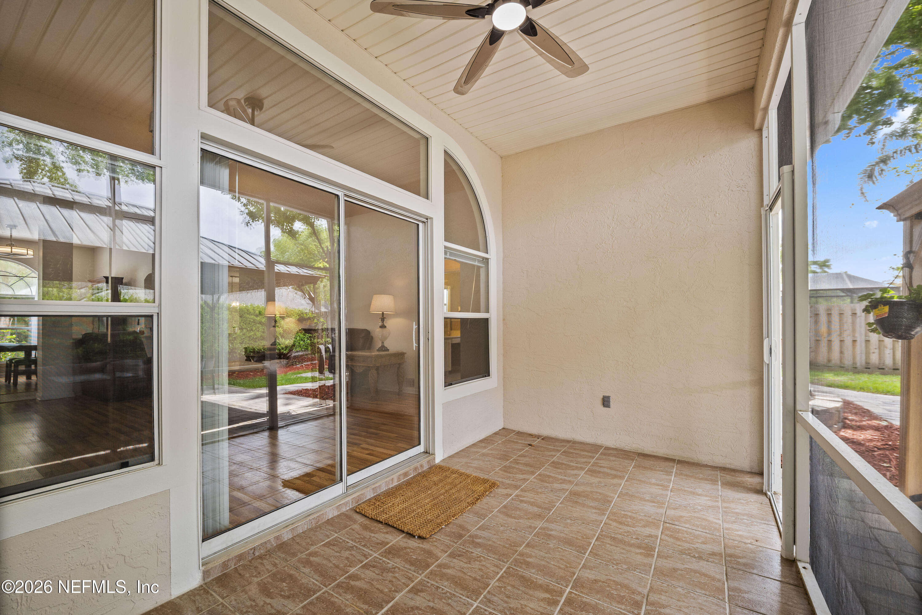 1940 Bluebonnet Way Fleming Island, FL 32003 - Photo 42 of 72 41 Screened-In Lanai