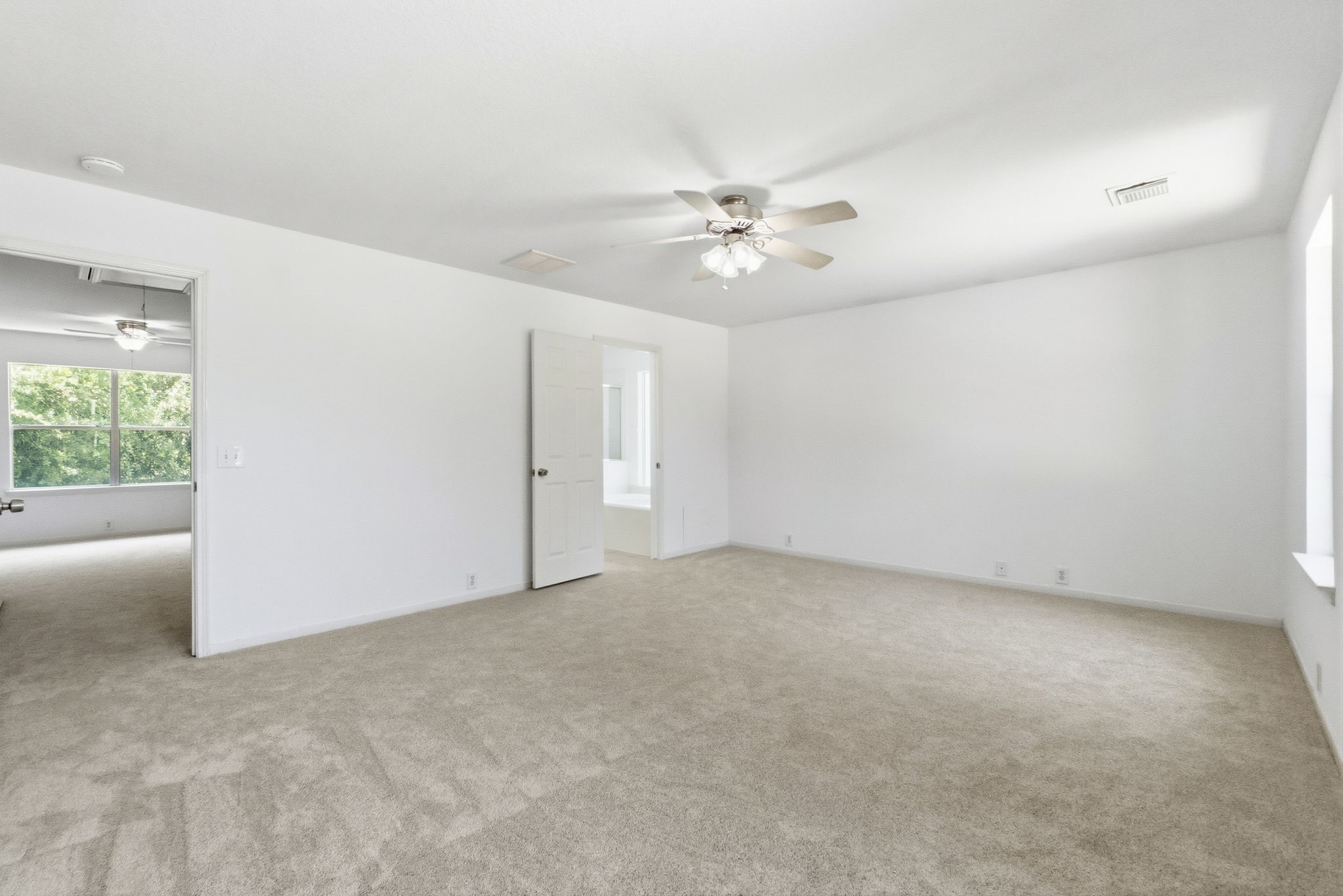 11907 Ezekiel Road Tomball, TX 77375 - Photo 25 of 39 a view of an empty room with a window
