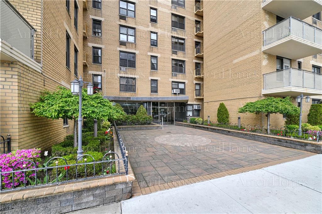 200 Corbin Place, Unit 2J Brooklyn, NY 11235 - Photo 2 of 5 a front view of a building with garden