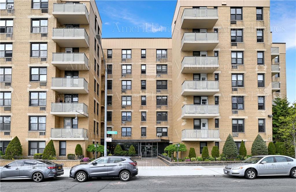 200 Corbin Place, Unit 2J Brooklyn, NY 11235 - Photo 3 of 5 a view of a street that has couple of cars parked on the roadside