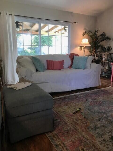 402 Juniper Street Destin, FL 32541 - Photo 4 of 20 a living room with furniture and a potted plant