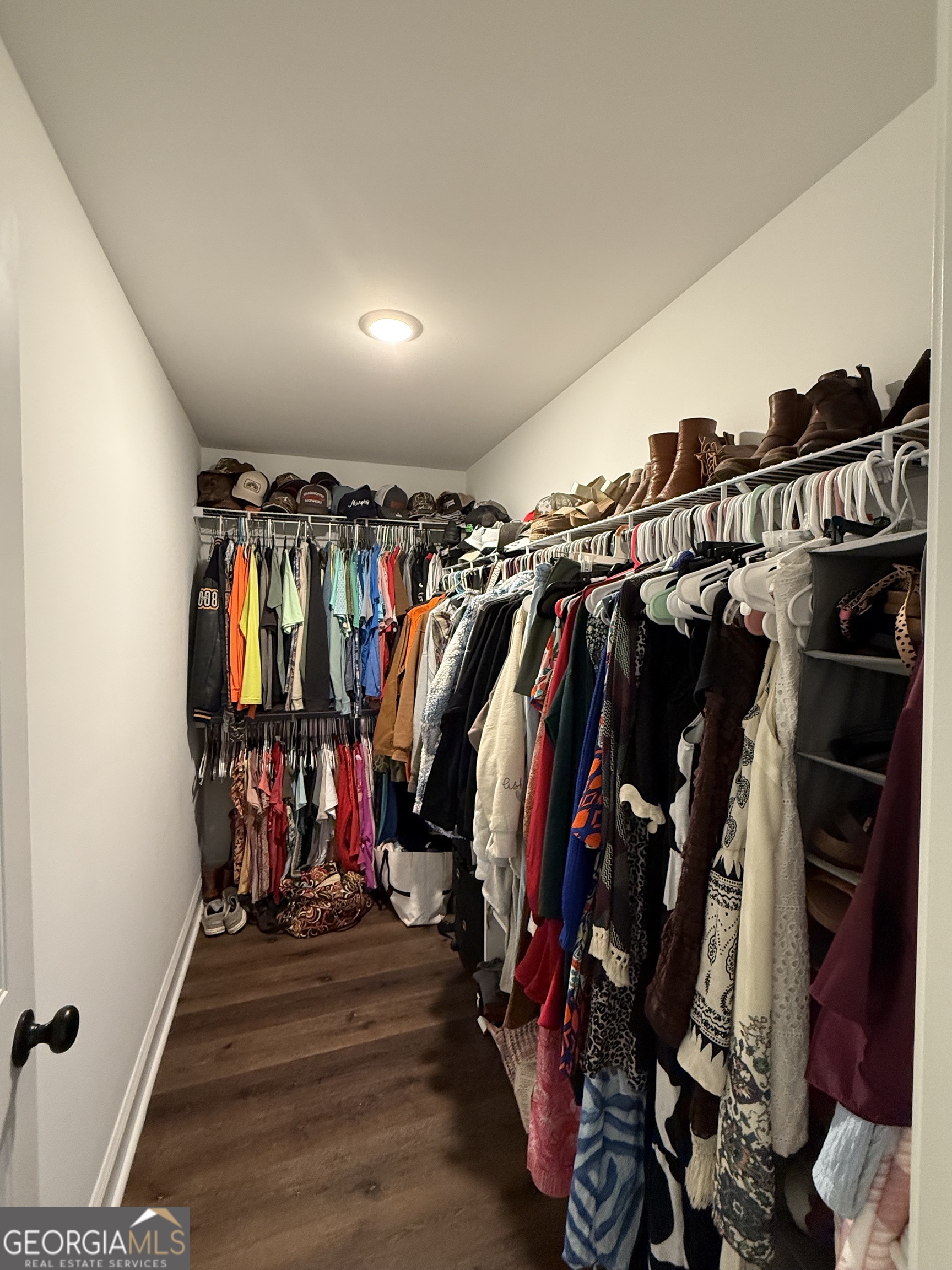 712 Scott Mill Road Hartwell, GA 30643 - Photo 21 of 31 a view of walk in closet with clothes