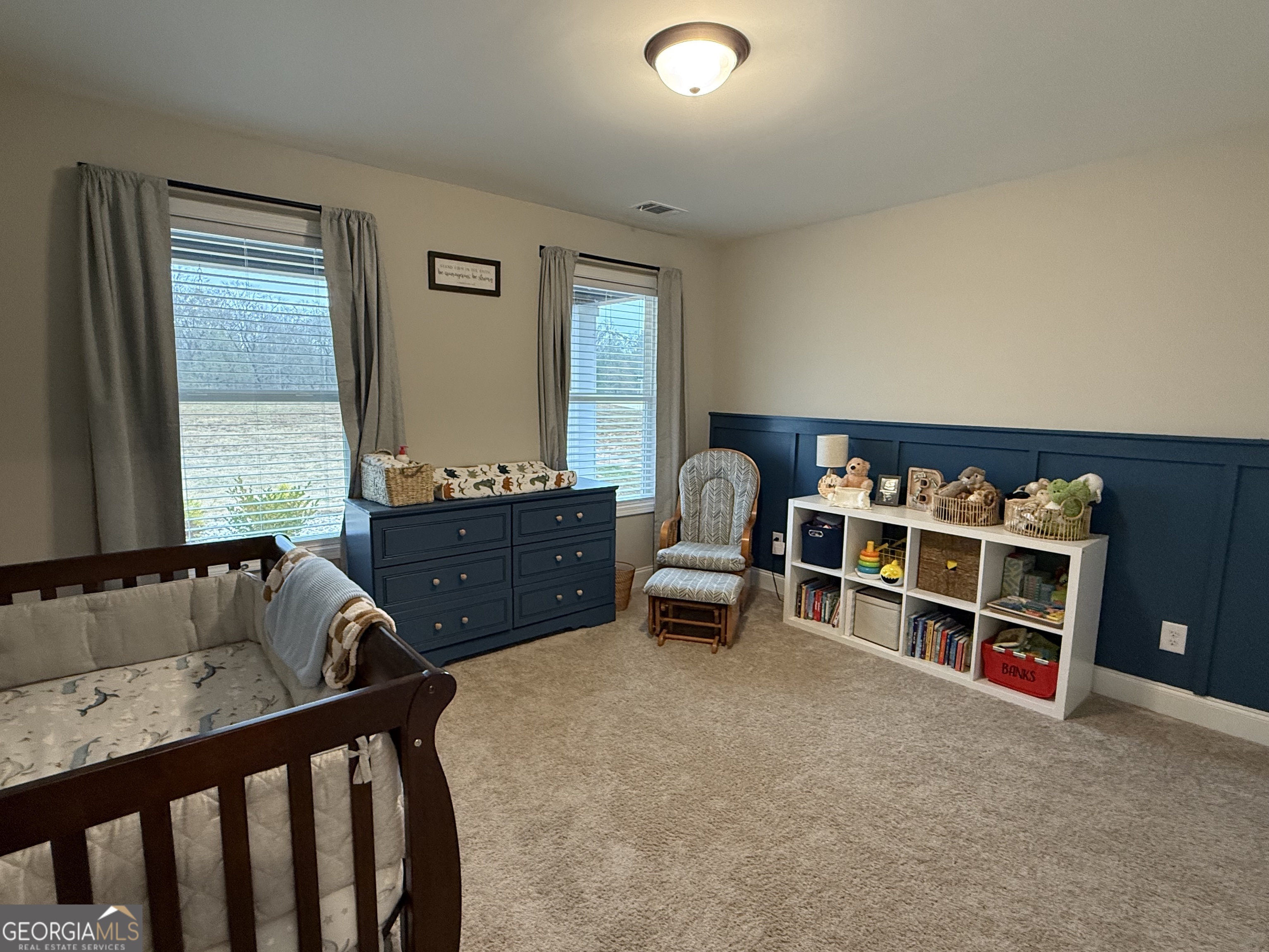 712 Scott Mill Road Hartwell, GA 30643 - Photo 22 of 31 a living room with furniture a rug and a window
