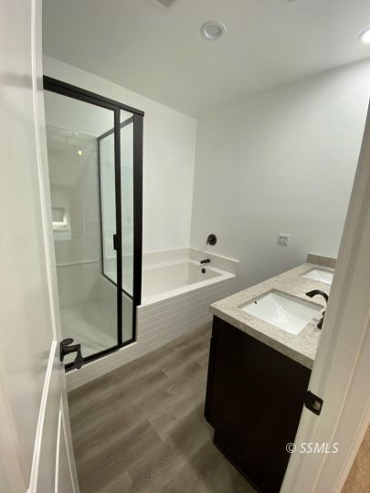 1046 Ocean Avenue Ridgecrest, CA 93555 - Photo 19 of 19 a bathroom with a sink toilet and shower