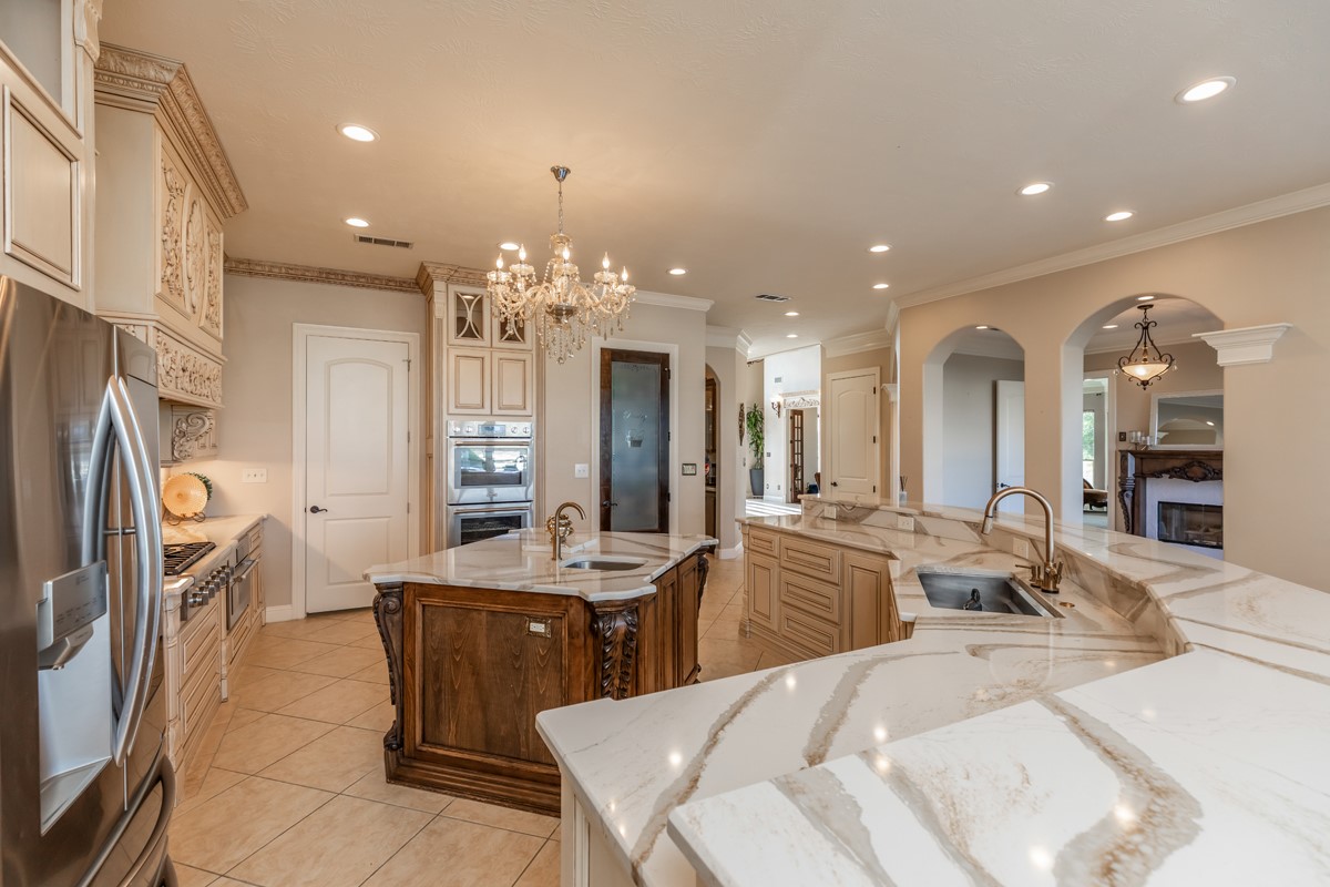 10940 Sheila Lane Beaumont, TX 77705 - Photo 16 of 50 a large kitchen with stainless steel appliances lots of counter space and breakfast area