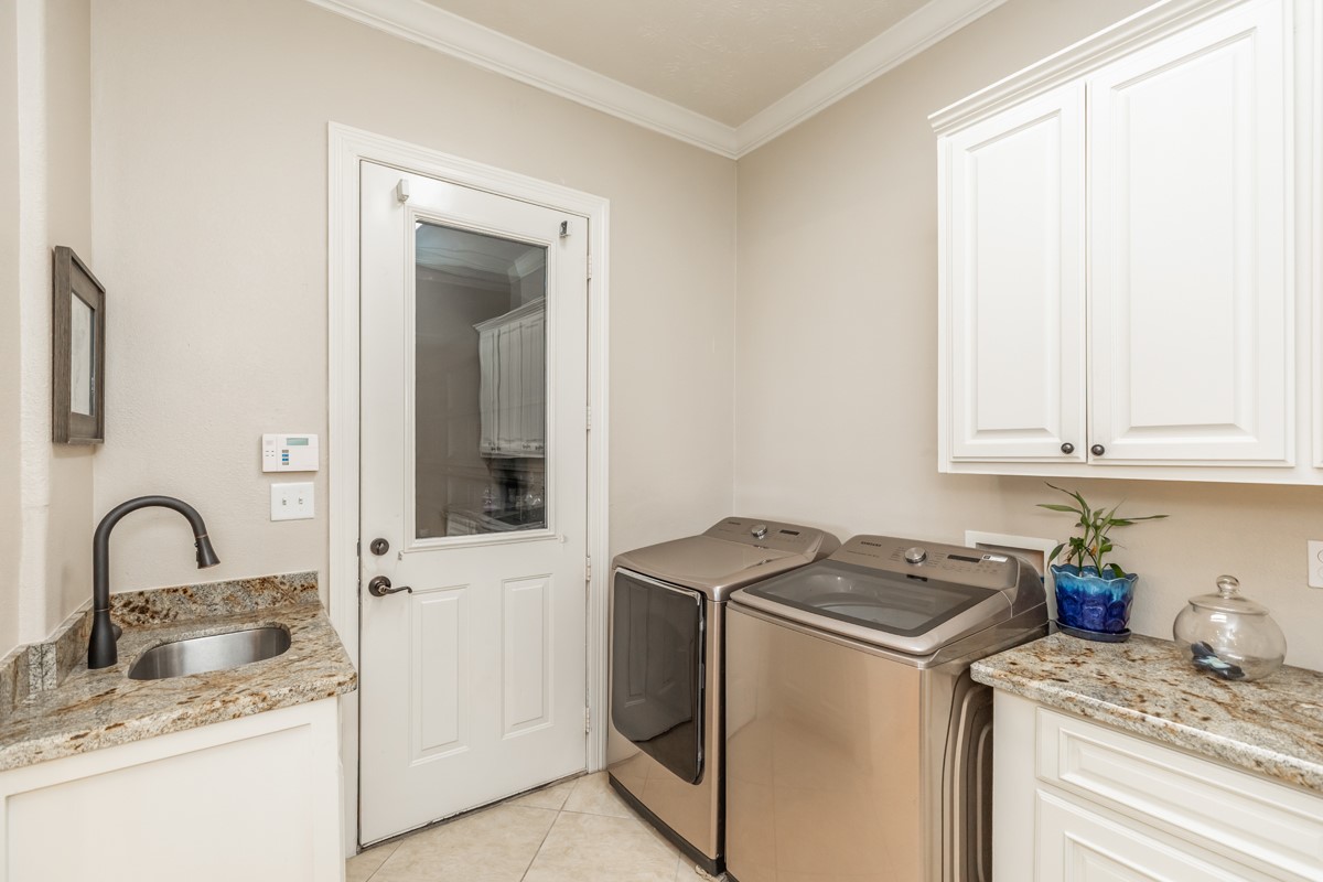 10940 Sheila Lane Beaumont, TX 77705 - Photo 18 of 50 a view of a kitchen with sink and dishwasher